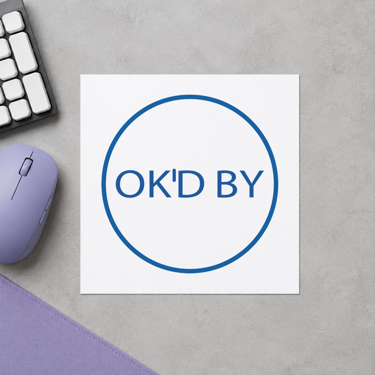 "OK'd by" imprint sized 5/8 in diameter on a document page
