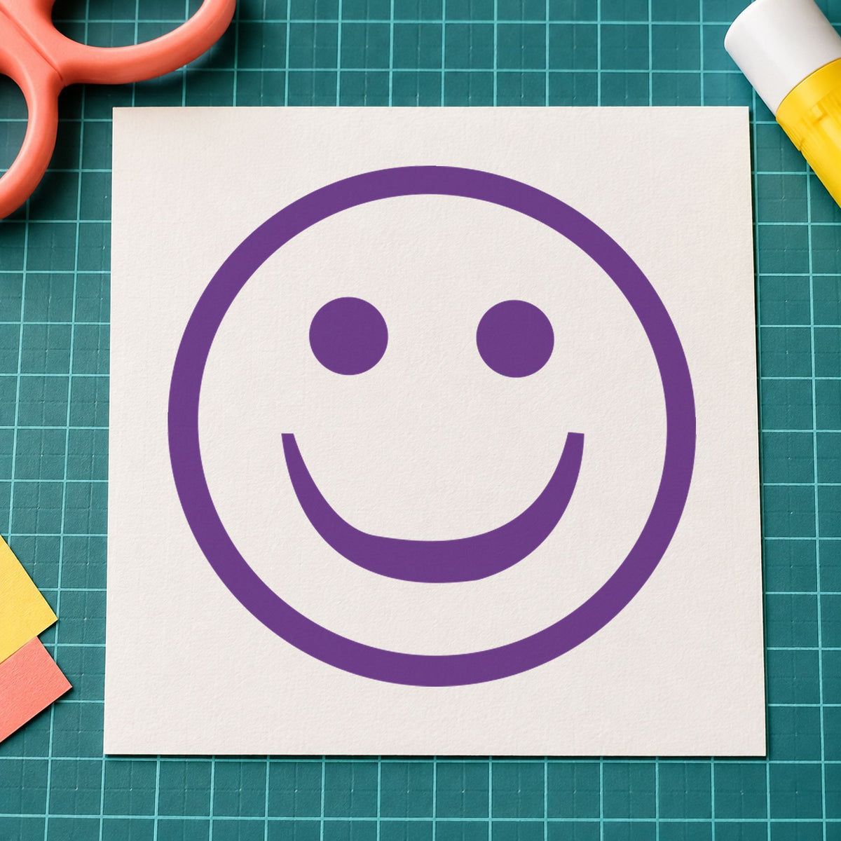 Pre-inked "Smiley face" stamp marking paperwork in an office setting