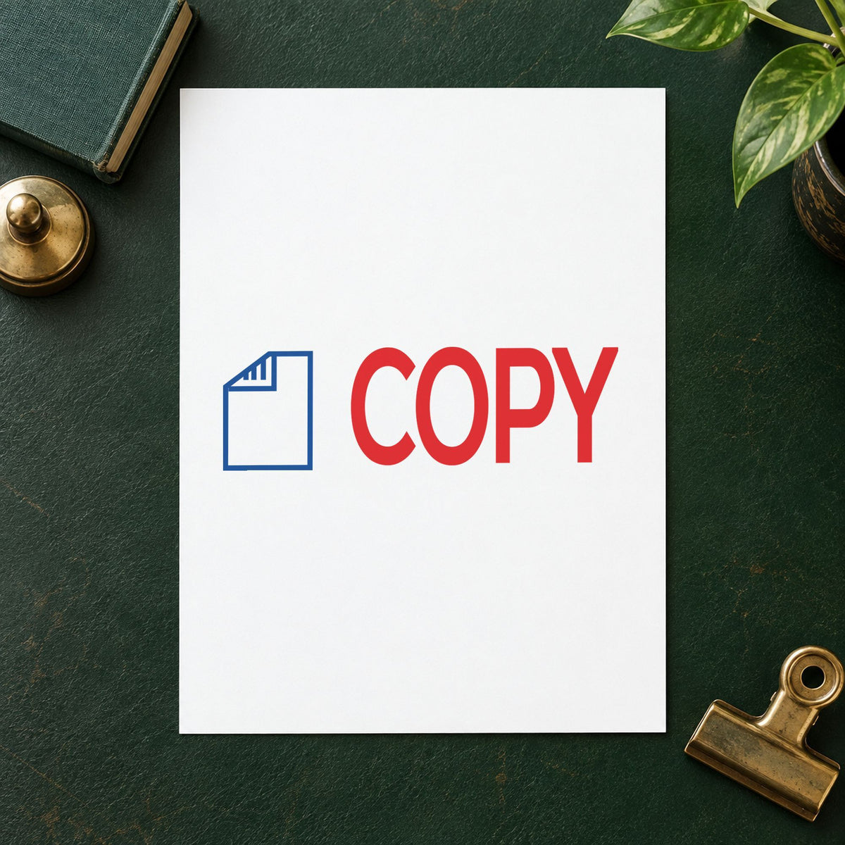 "Copy" Xstamper stamp in use on paper, Approximately 1/2 in tall x 1-5/8 in wide rectangle imprint