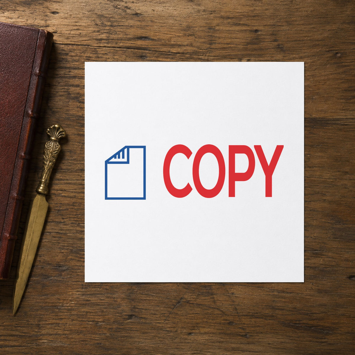 "Copy" Xstamper pre-inked stamp beside its rectangle imprint