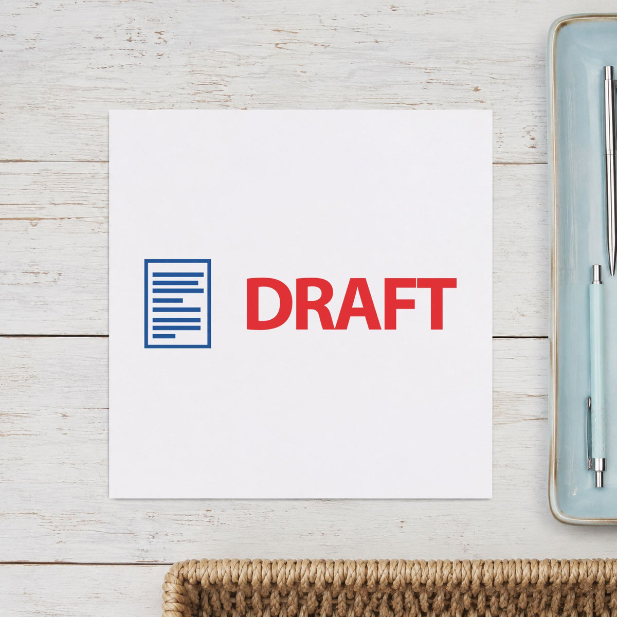 "Draft" stamp pressed on paper, no separate ink pad needed