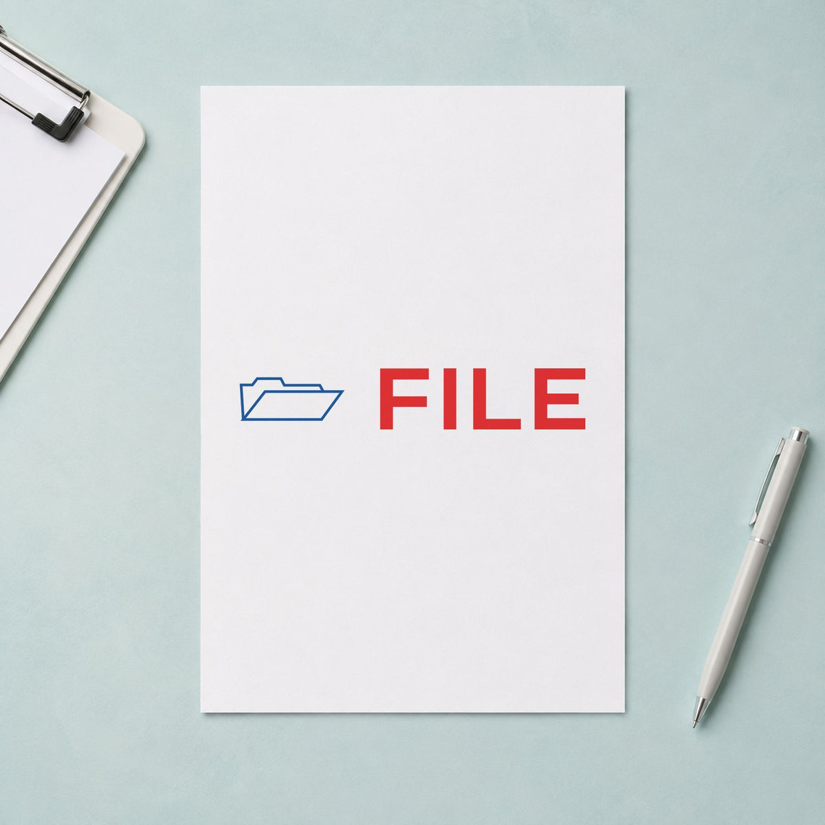 "File" Xstamper stamp in use on paper, 1/2 x 1-5/8 in rectangle imprint