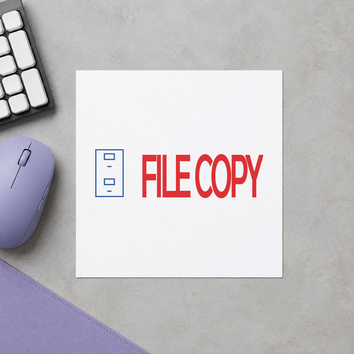 Pre-inked "File copy" stamp marking paperwork in an office setting