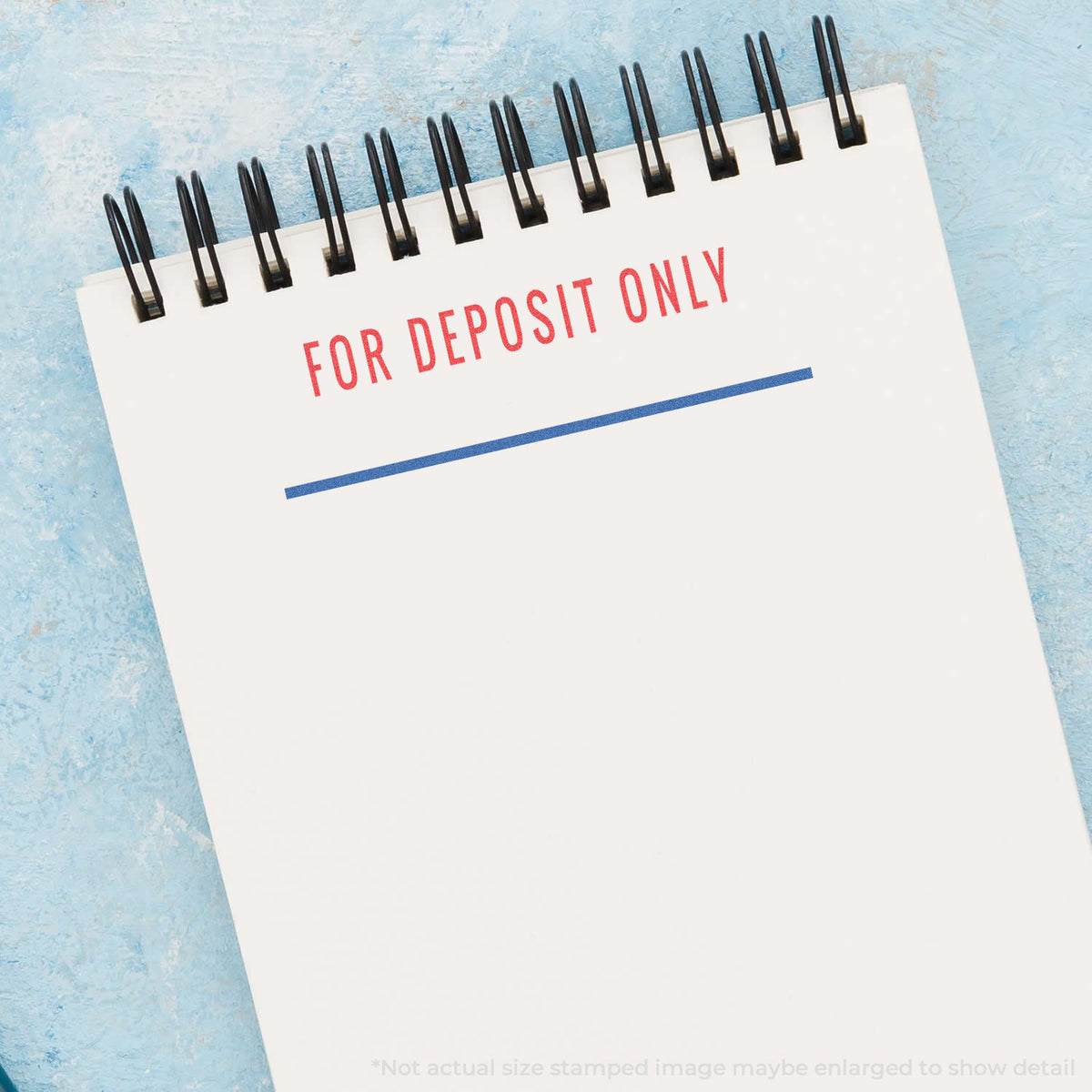 "For deposit only" pre-inked imprint on a page, rectangle shape at 1/2 x 1-5/8 in