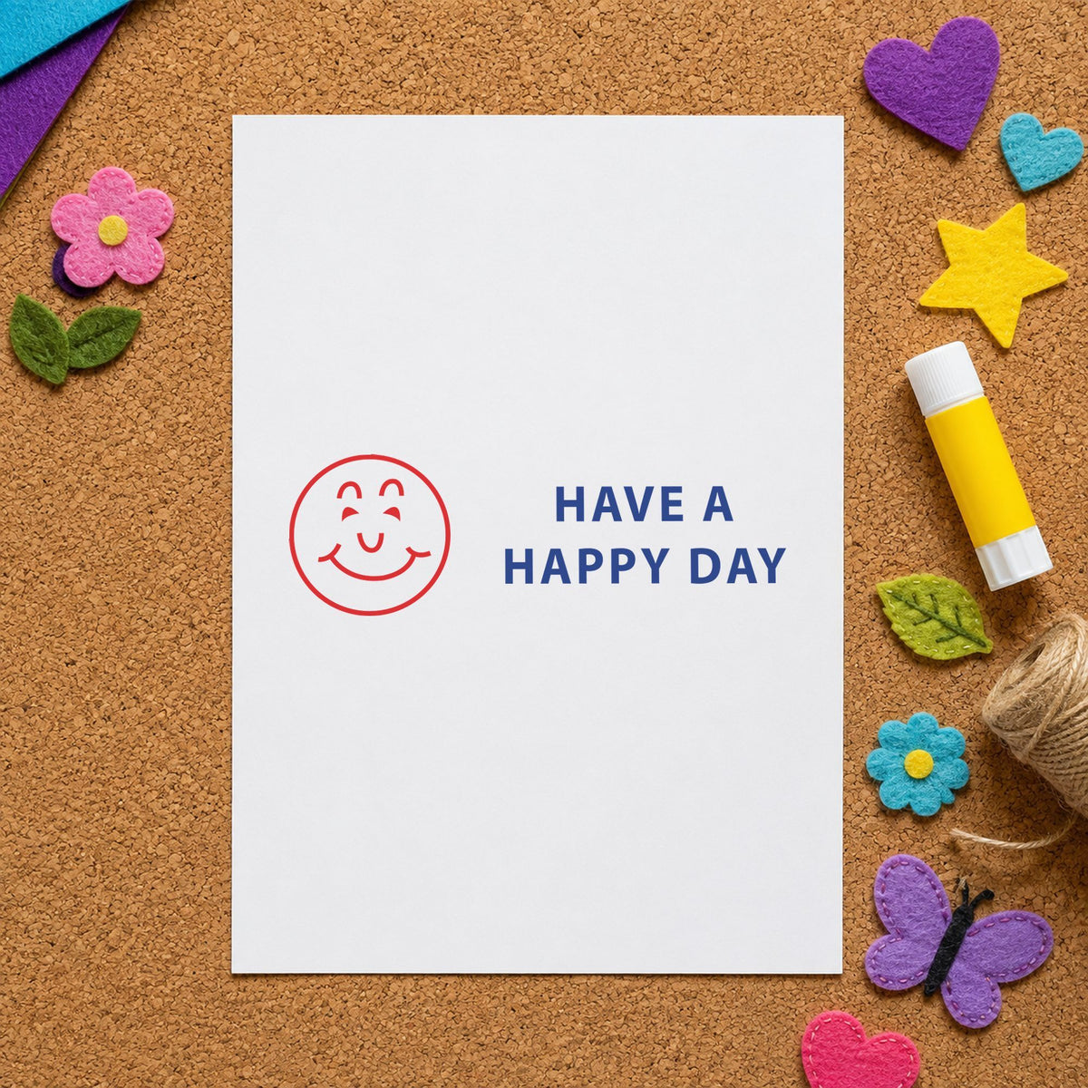 Pre-inked "Have a happy day" stamp applied to a document, Approximately 1/2 in tall x 1-5/8 in wide impression