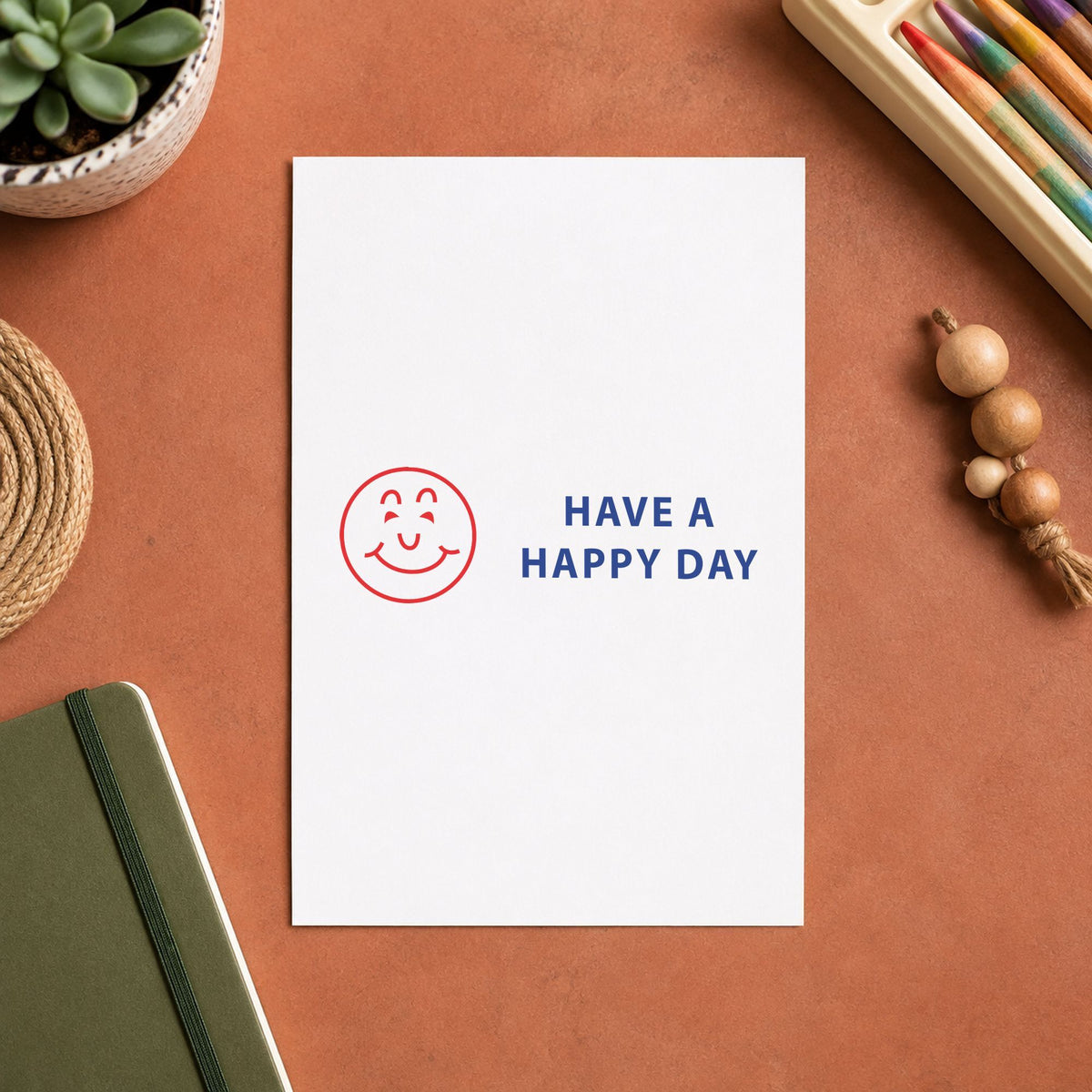 "Have a happy day" Xstamper stamp at work on everyday office paperwork