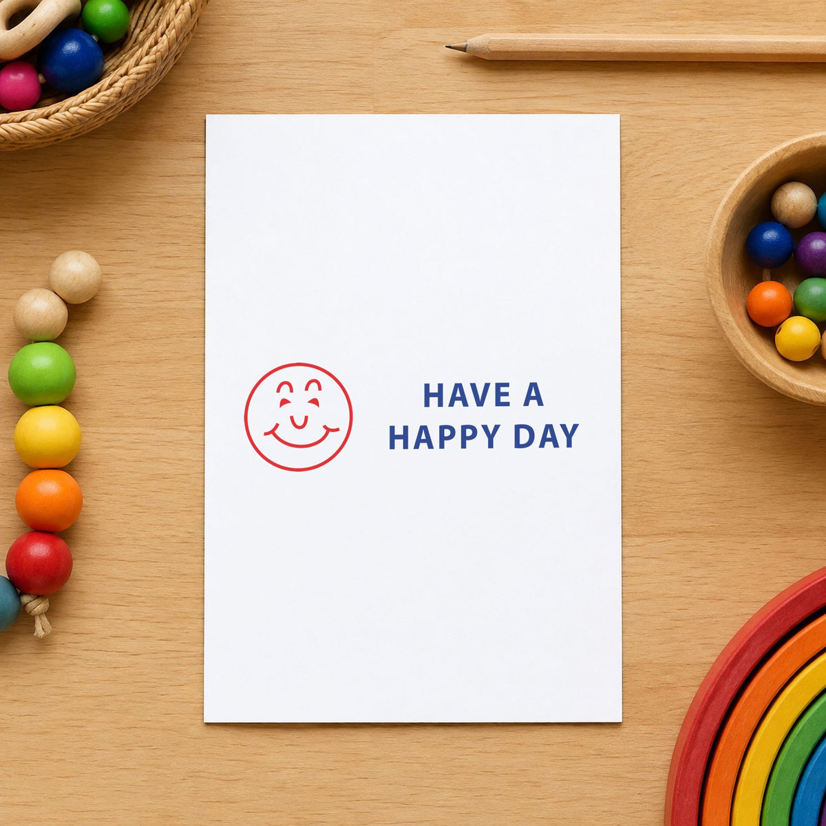 "Have a happy day" Xstamper pre-inked stamp beside its rectangle imprint