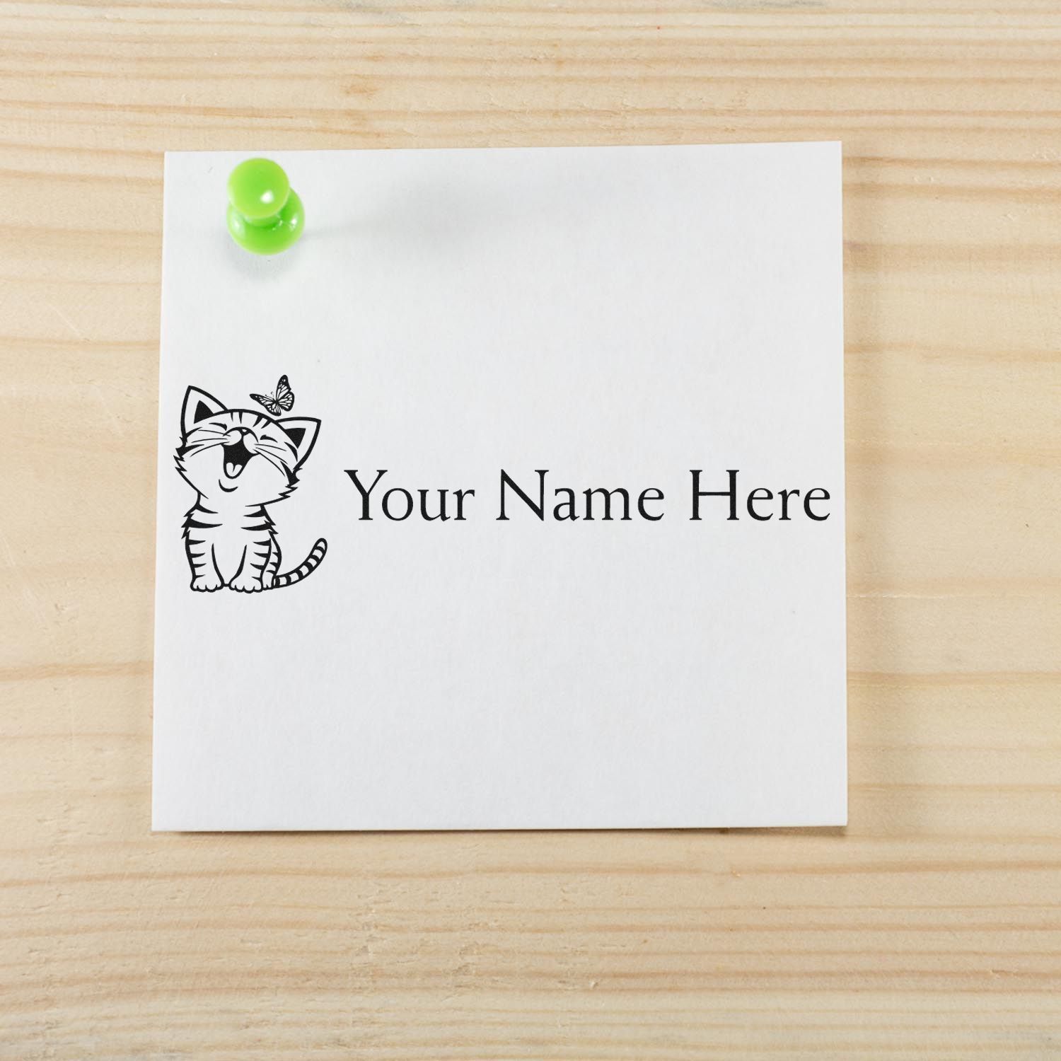 ESS Wood Handle Kitten Joy personalized ink rubber stamp in use, featuring custom name stamp with wooden handle.