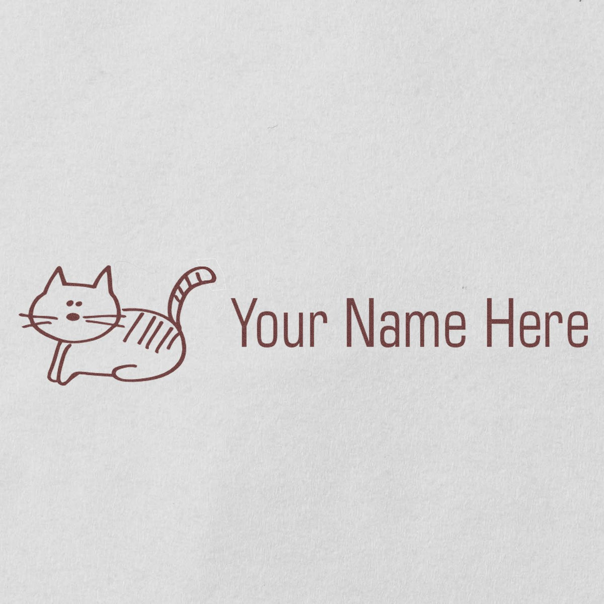 Brown cat custom stamp seal with Your Name Here on white paper.