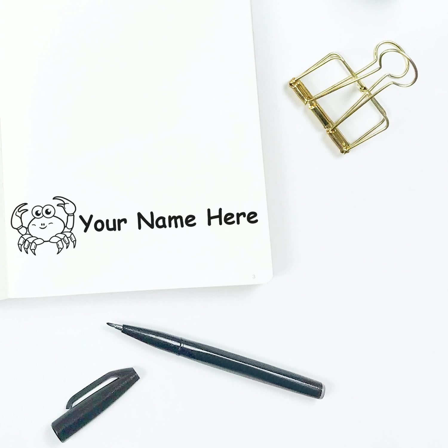 ESS Wood Handle Crabby Custom Signature Rubber Stamp in use, featuring a personalized name stamp with a wooden handle.