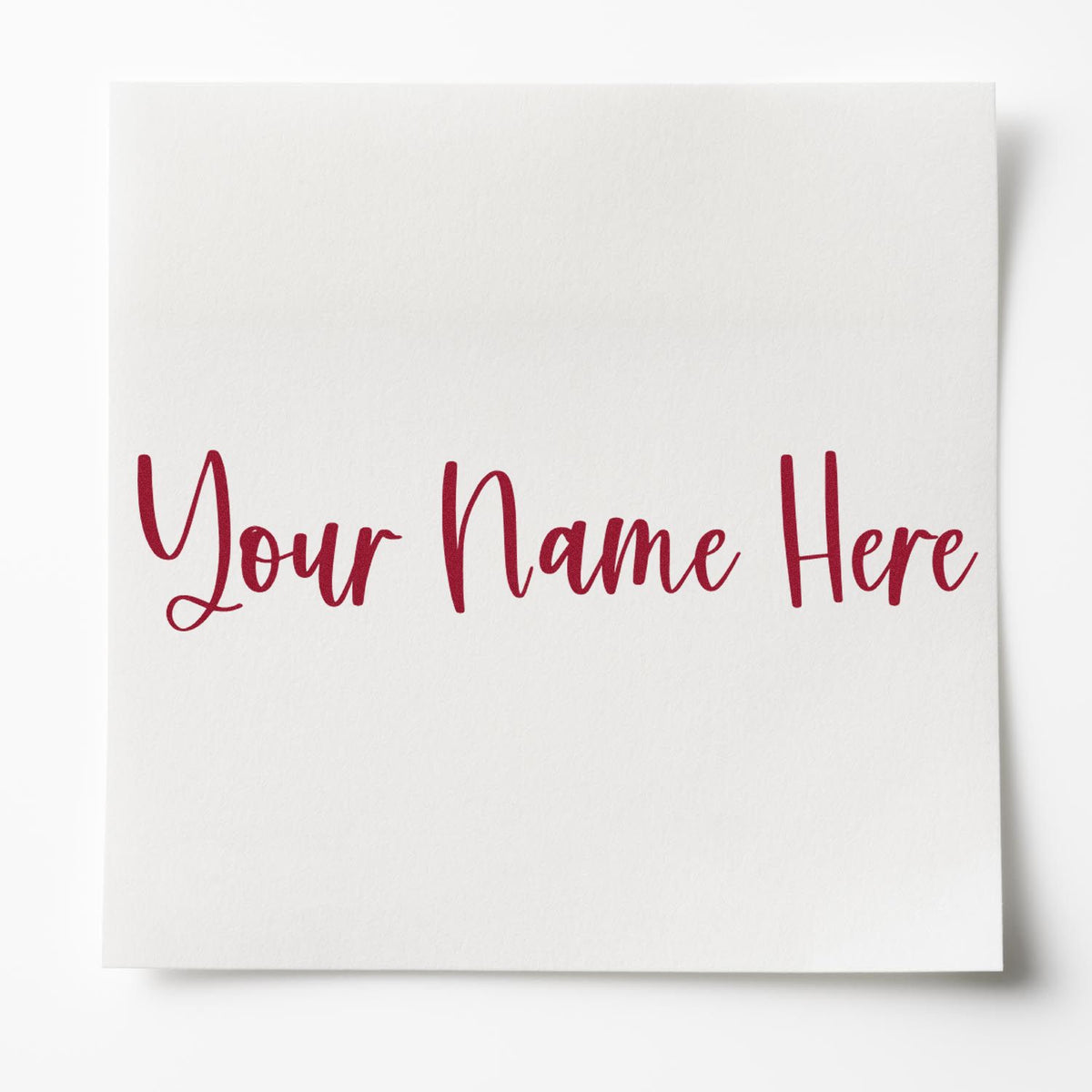 White textured custom stamp and seal card with burgundy script reading ÂYour Name Here.Â