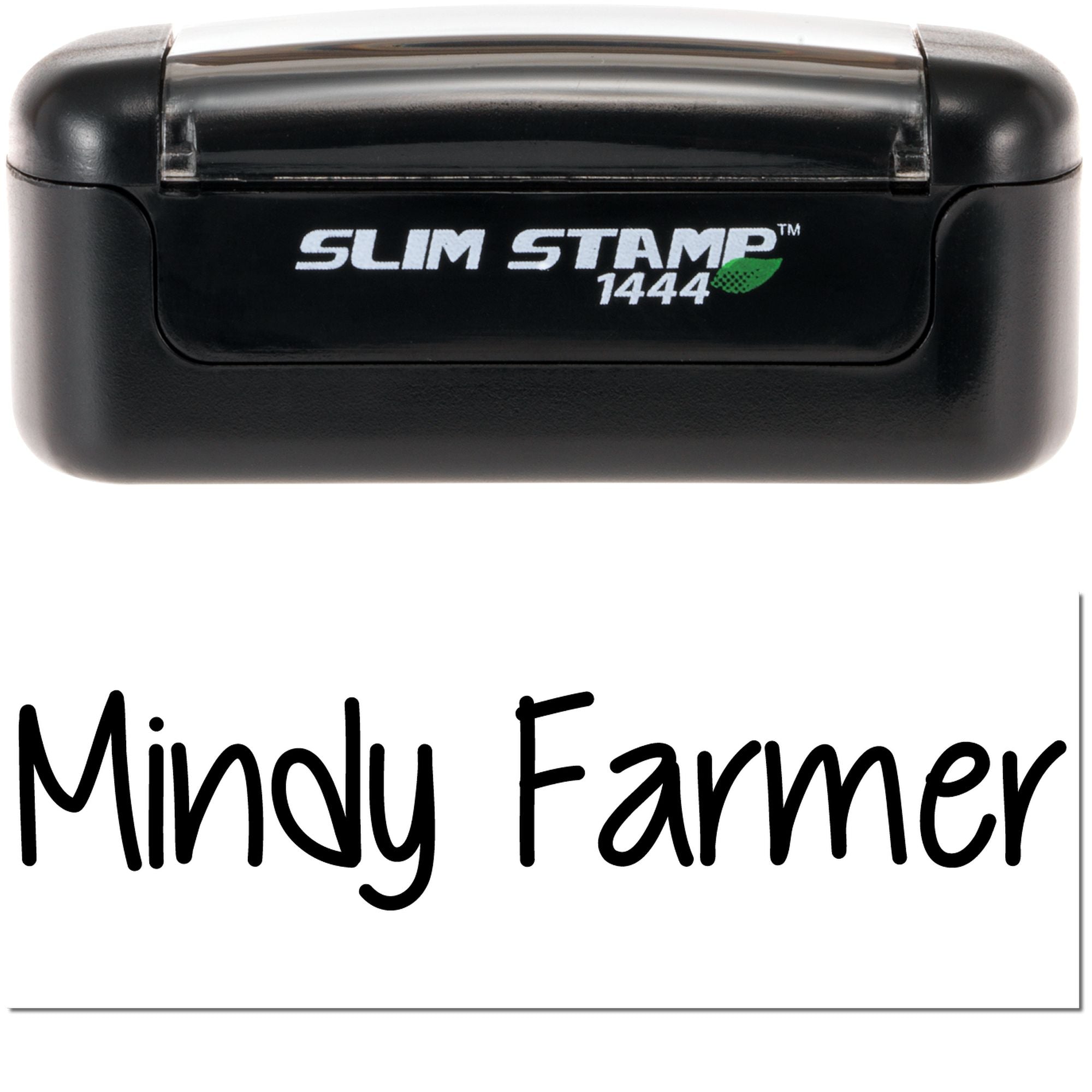 Black Slim Stamp 1444 self-inking stamp and seal with white logo, shown above a Mindy Farmer signature on a white background.