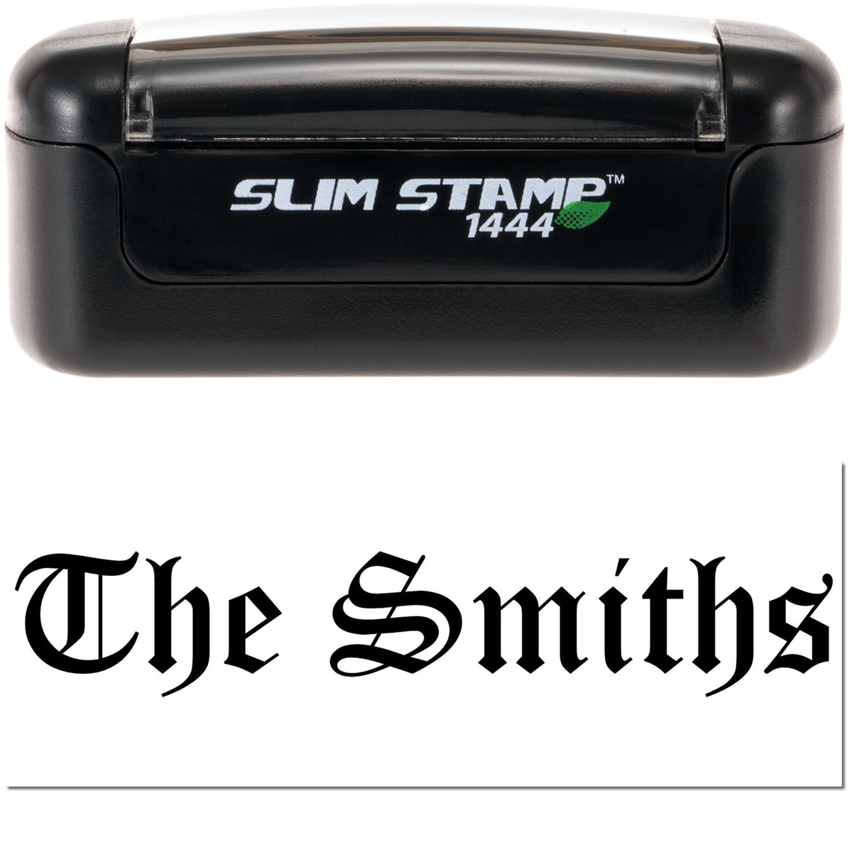 Black Slim Stamp 1444 self-inking stamp with white branding and gothic black The Smiths seal on white paper.