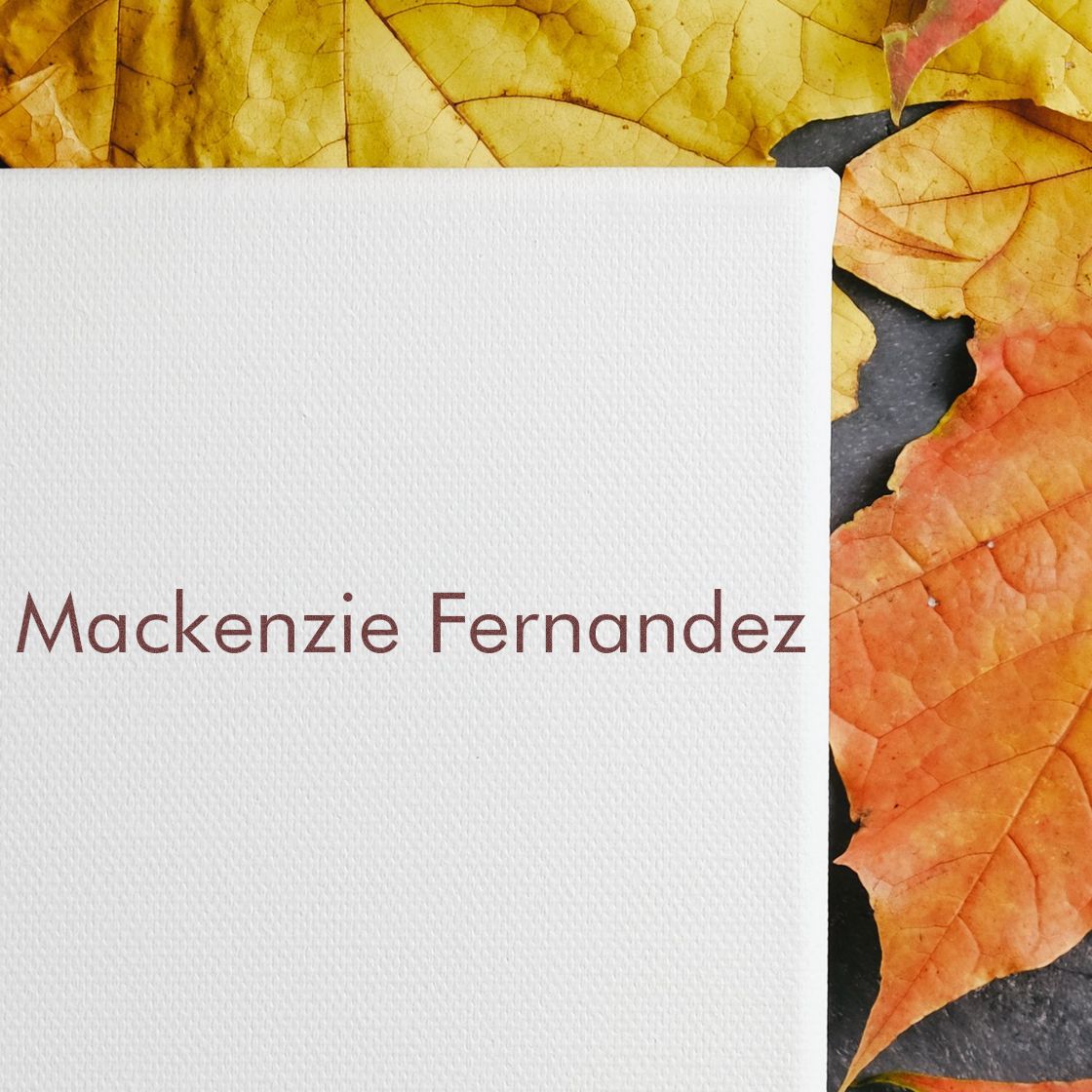 Custom stamp and seal on textured white card, maroon Mackenzie Fernandez, bordered by gold and orange autumn leaves.