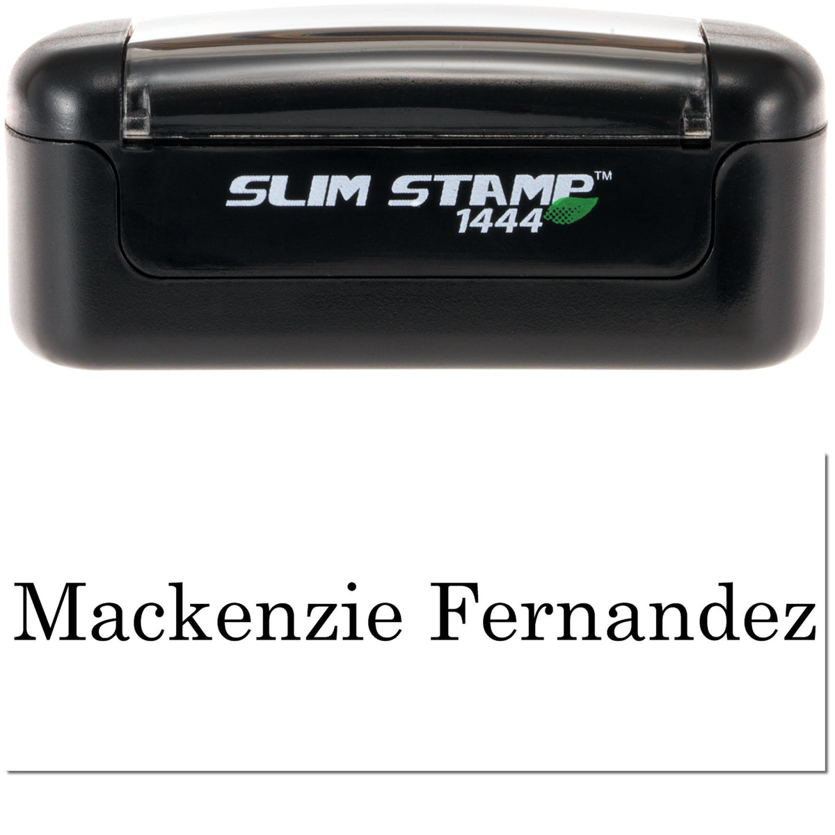 Black self-inking Slim Stamp 1444 with green leaf logo and Mackenzie Fernandez imprint on white paper.