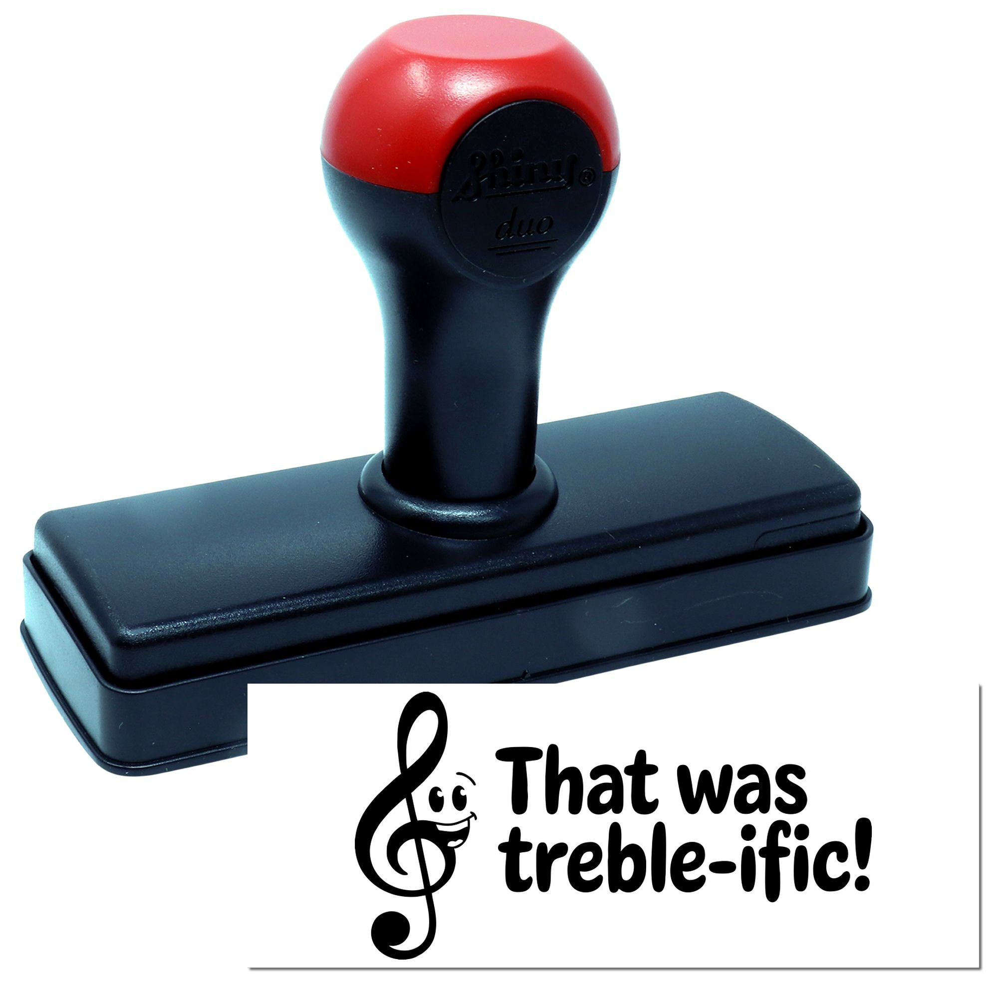 Red and black self-inking stamp with rectangular seal and treble-clef That was treble-ific! impression