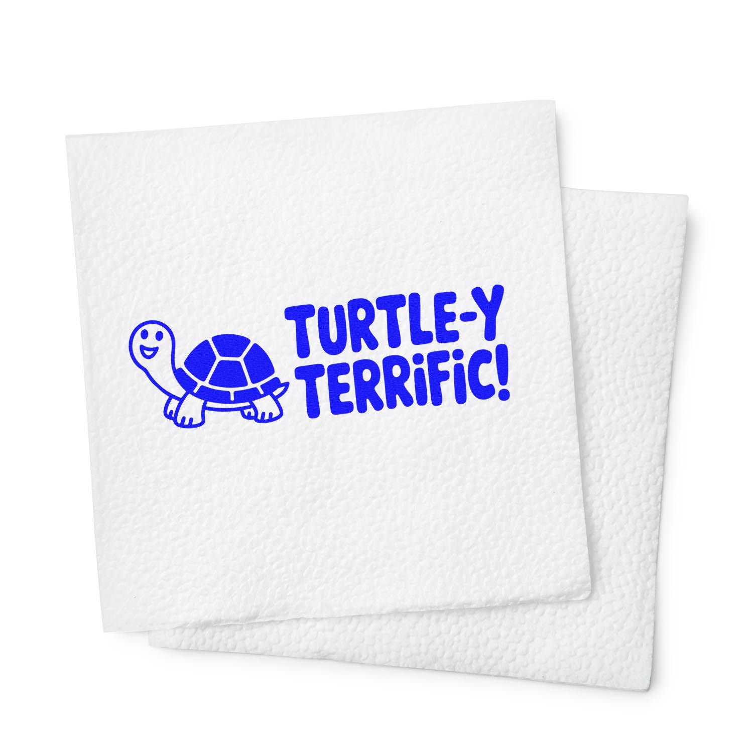 Blue turtle stamp reading Turtle-y Terrific! on white textured stamp-and-seal paper sheets.