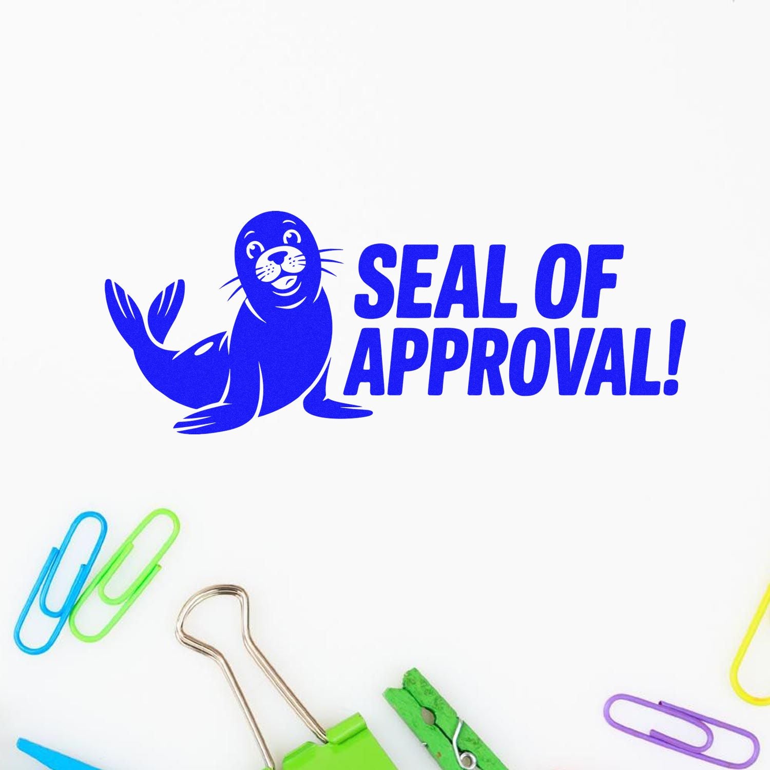 Blue seal approval stamp featuring a smiling seal graphic on white, with colorful paper clips.
