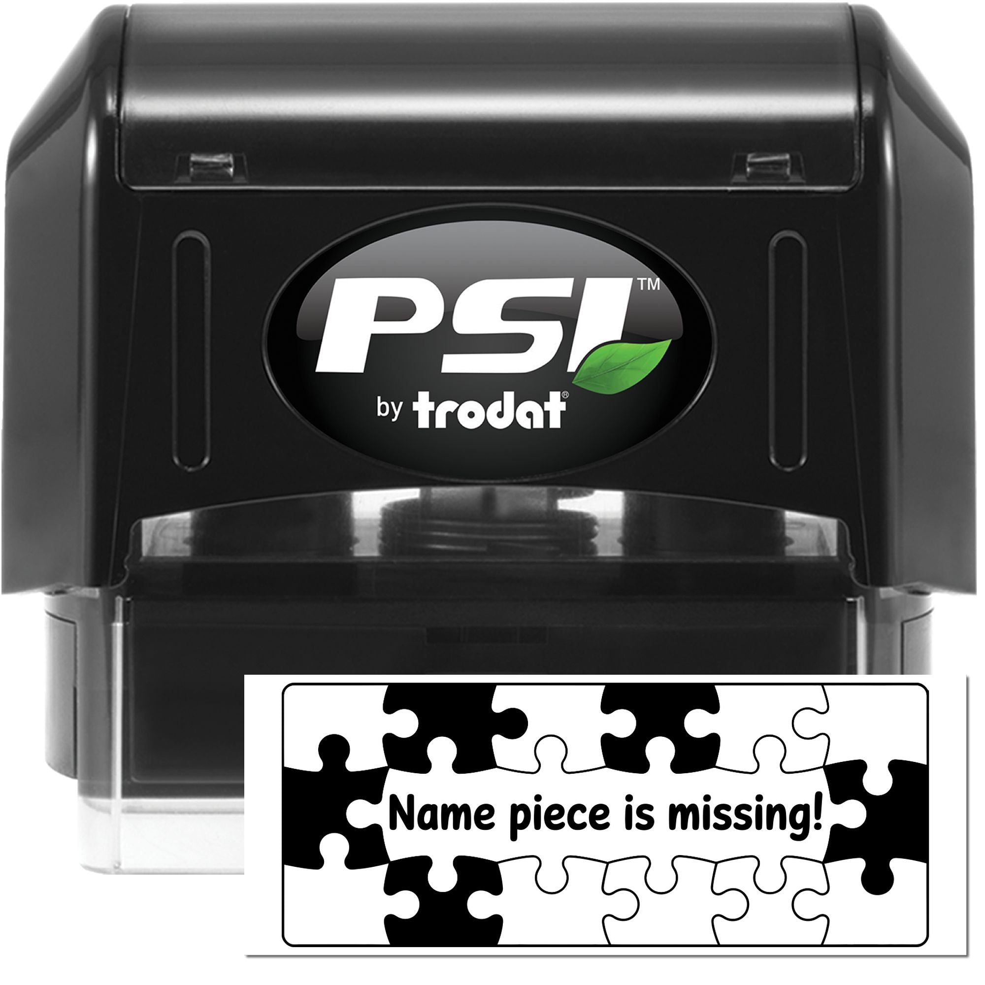 Black PSI by Trodat self-inking stamp and seal with green leaf logo; white puzzle label says Name piece is missing!