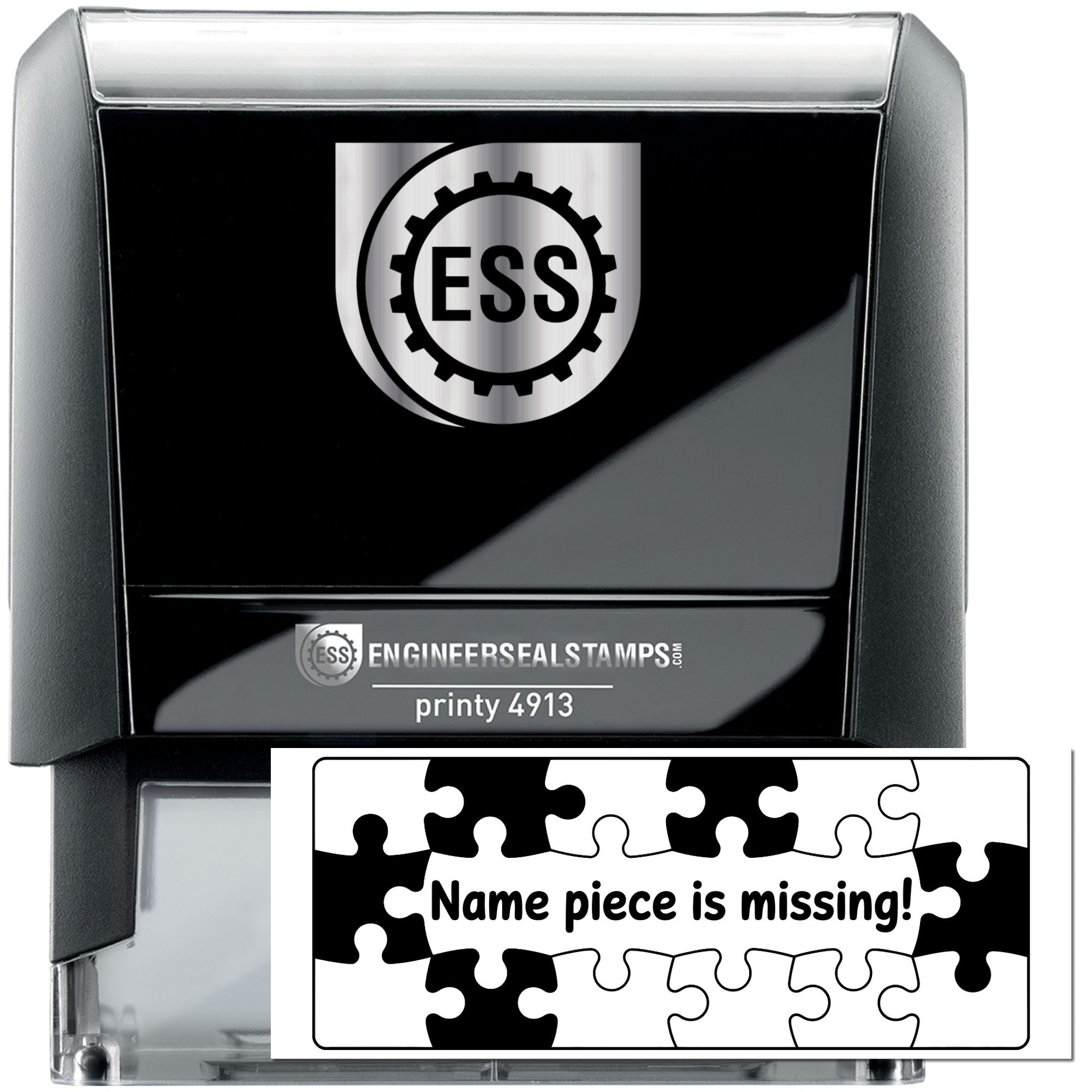 Black self-inking ESS stamp and seal with silver logo, showing a puzzle-piece name badge reading Name piece is missing!
