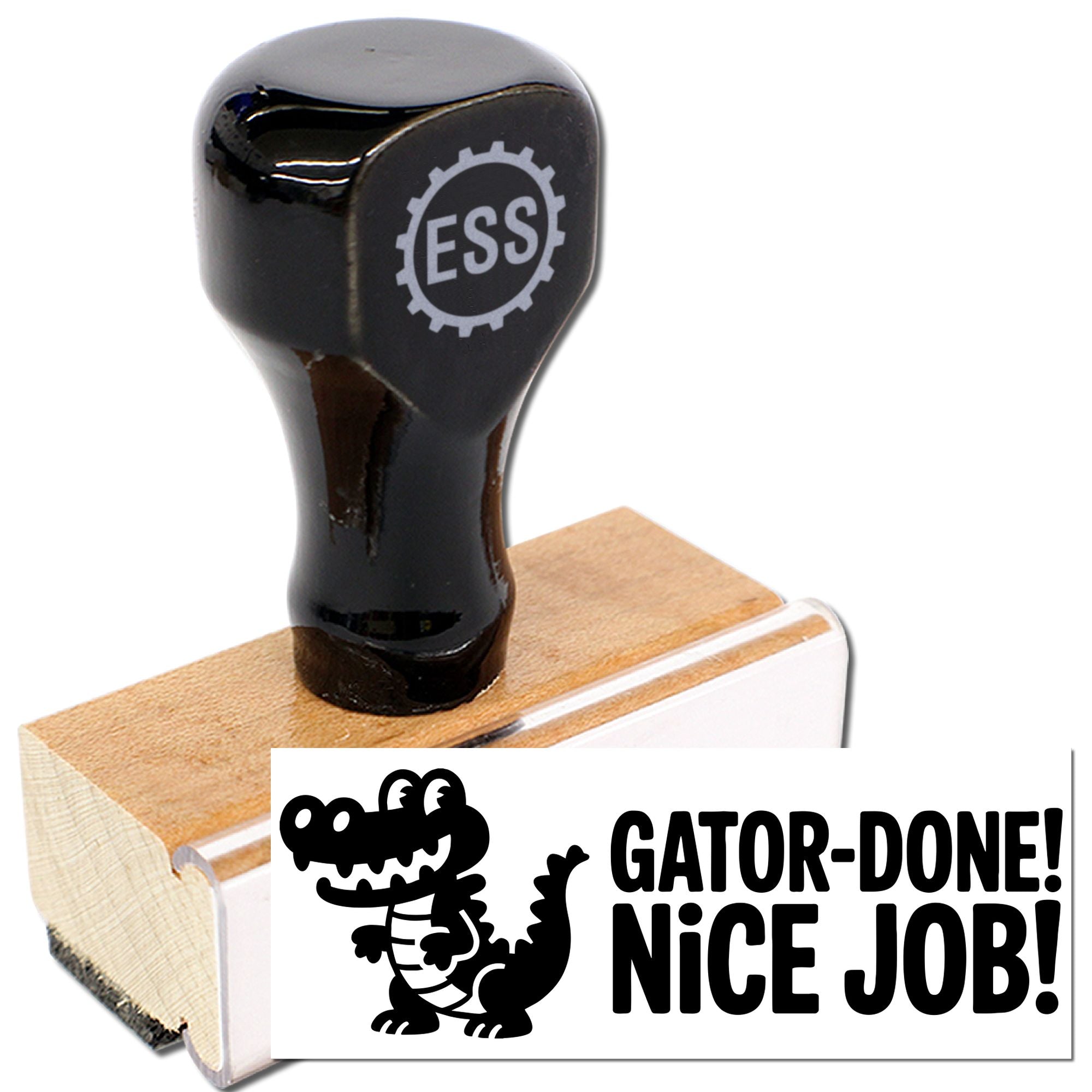 Black rubber stamp on wood block with white Gator-Done! Nice Job! dinosaur seal and glossy black handle.