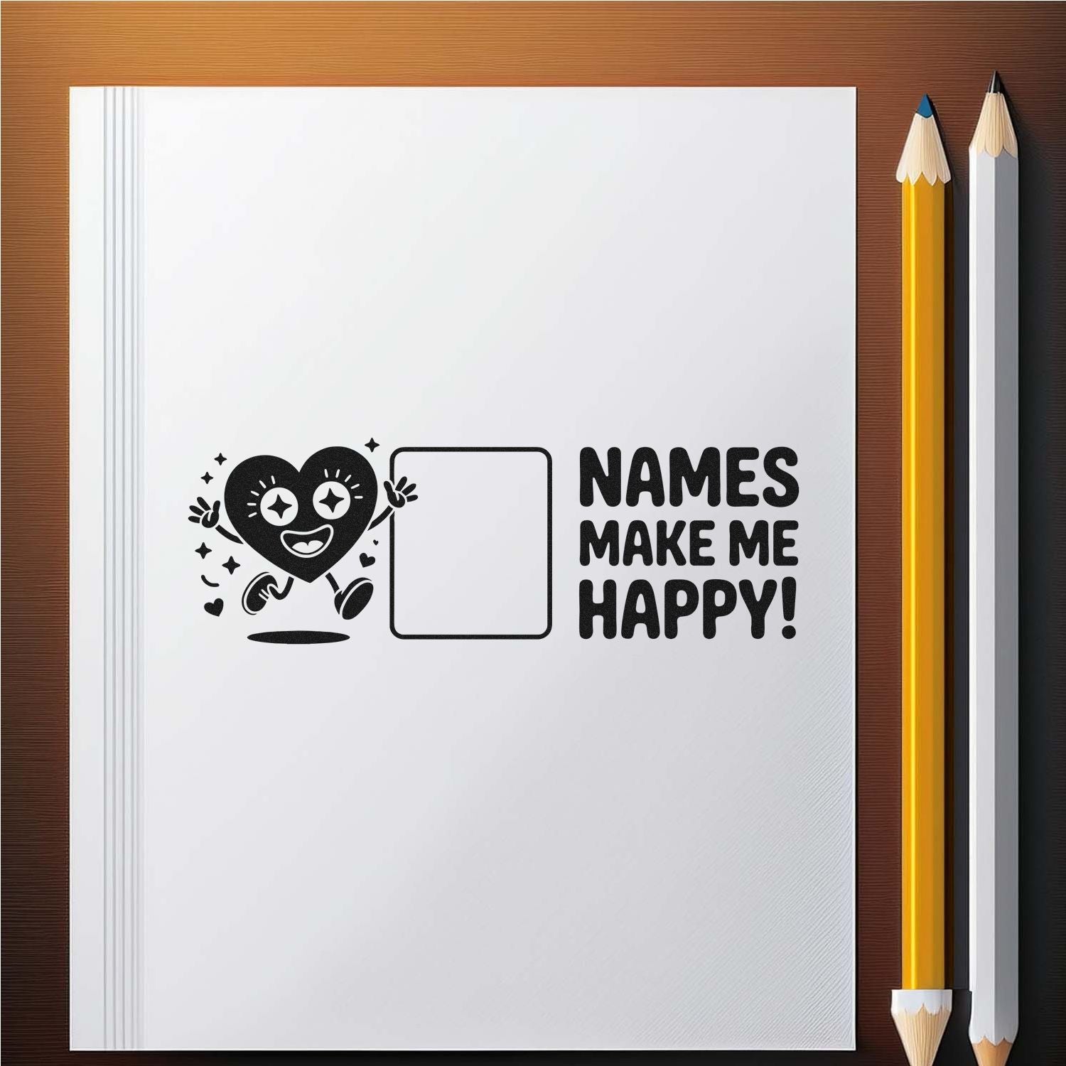 Custom name stamp and seal design on white notebook, with black heart character, blank label box, and yellow-gray pencils.