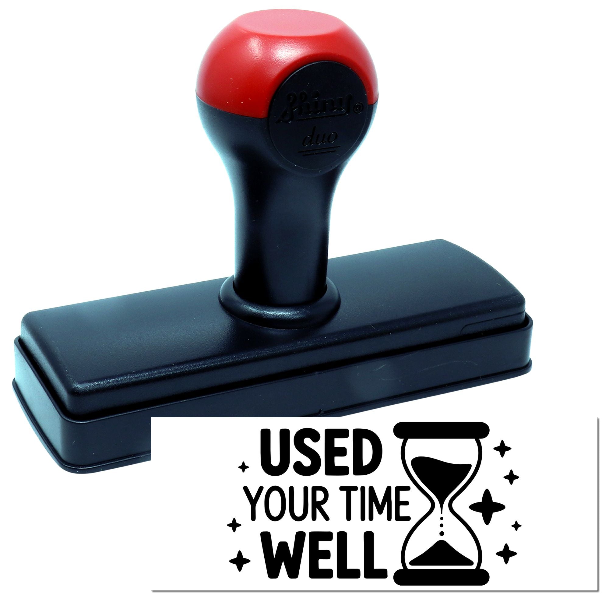 Red and black self-inking stamp and seal with USED YOUR TIME WELL text and hourglass design.