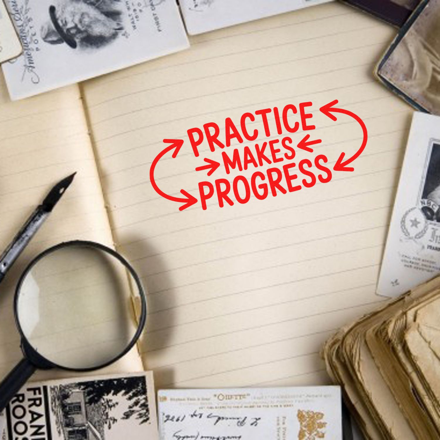 Red Practice Makes Progress stamp on a beige notebook, framed by vintage seal stamps, magnifying glass, and paper ephemera.