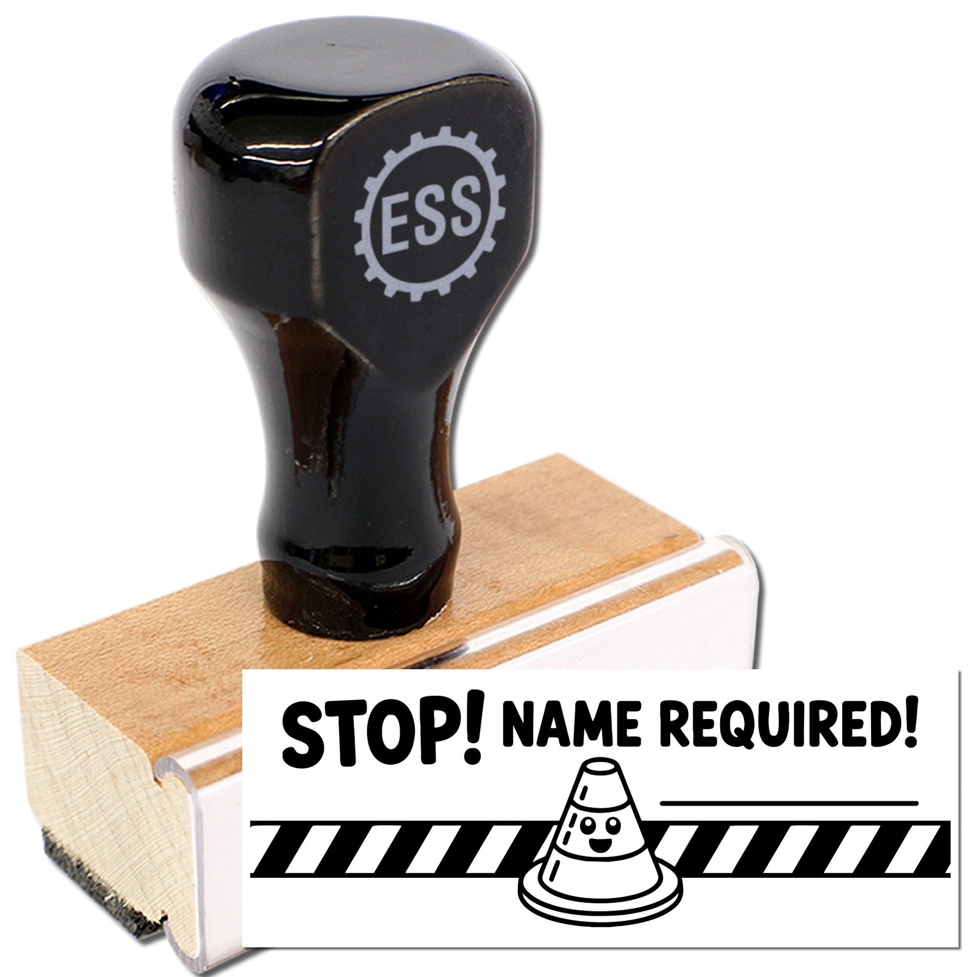 Black ESS rubber stamp on tan wooden block with seal reading STOP! NAME REQUIRED!