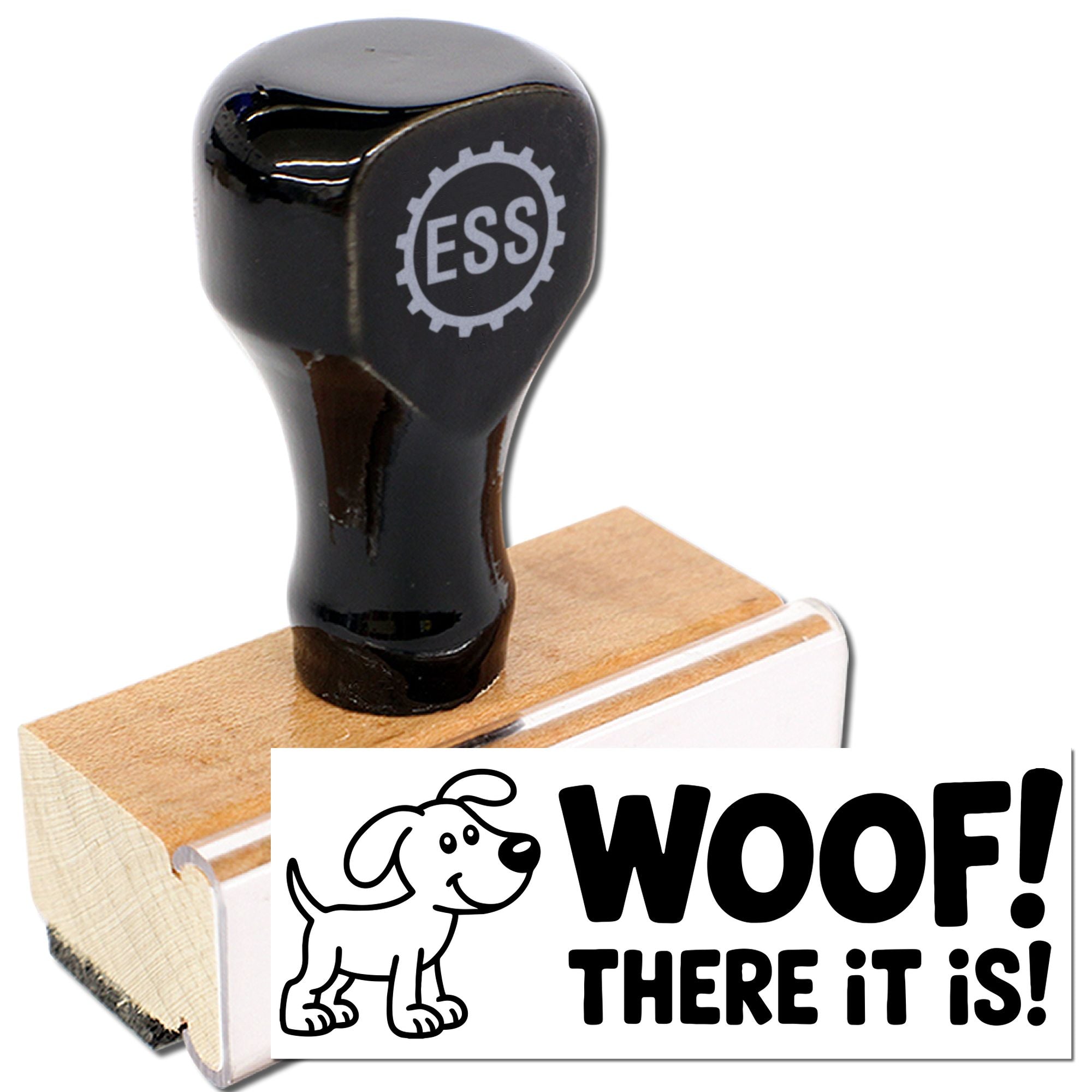 Black rubber stamp and wooden base with dog graphic, bold WOOF! THERE IT IS! seal on white.