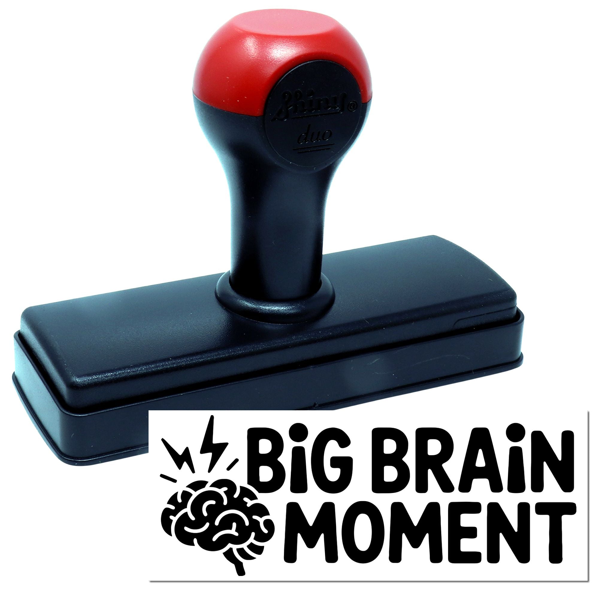 Red and black self-inking stamp and seal with rectangular base and bold Big Brain Moment imprint.