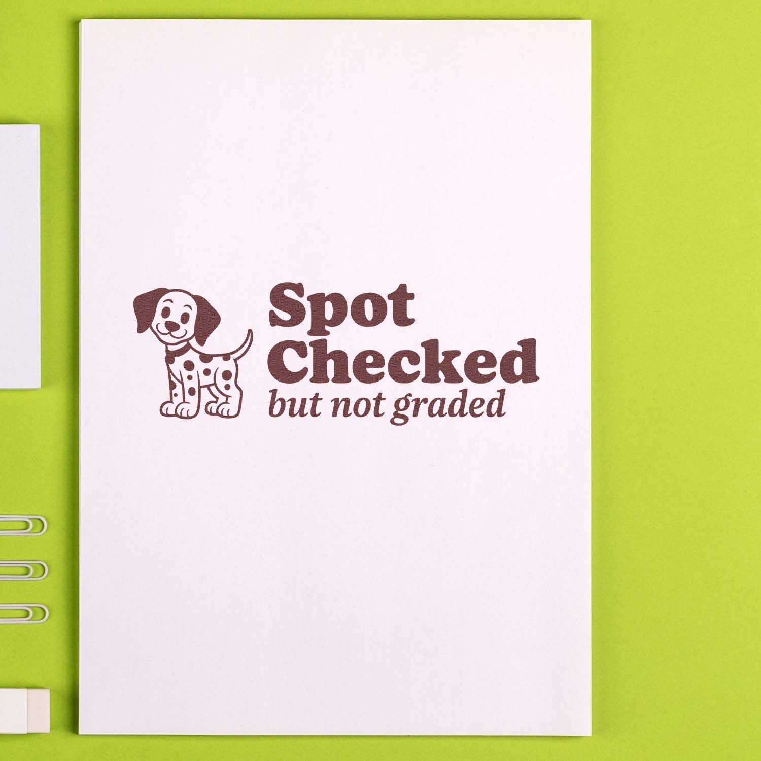 Brown custom stamp and seal with cartoon dog and Spot Checked but not graded on white card, lime green background.