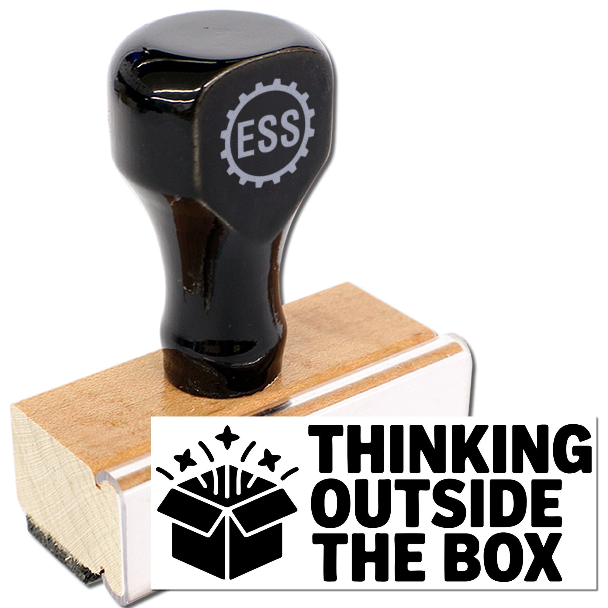 Black rubber stamp and wooden seal block with Thinking Outside the Box design on a white background.