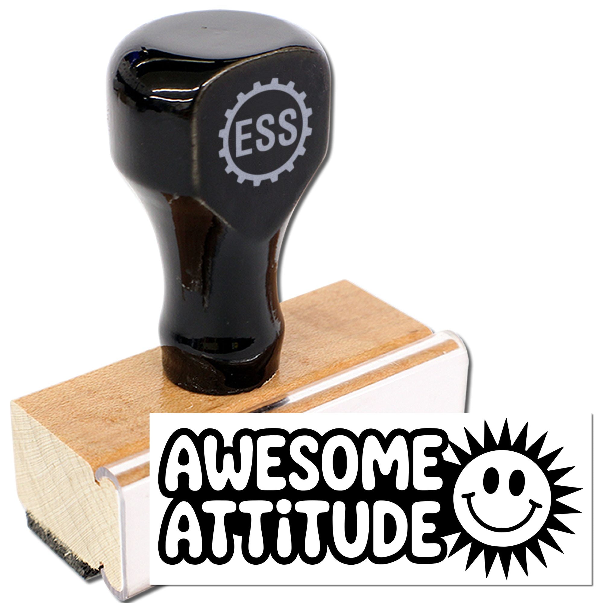 Black rubber stamp and seal with ESS logo, printing AWESOME ATTITUDE and a sun smiley in bold black on wood.