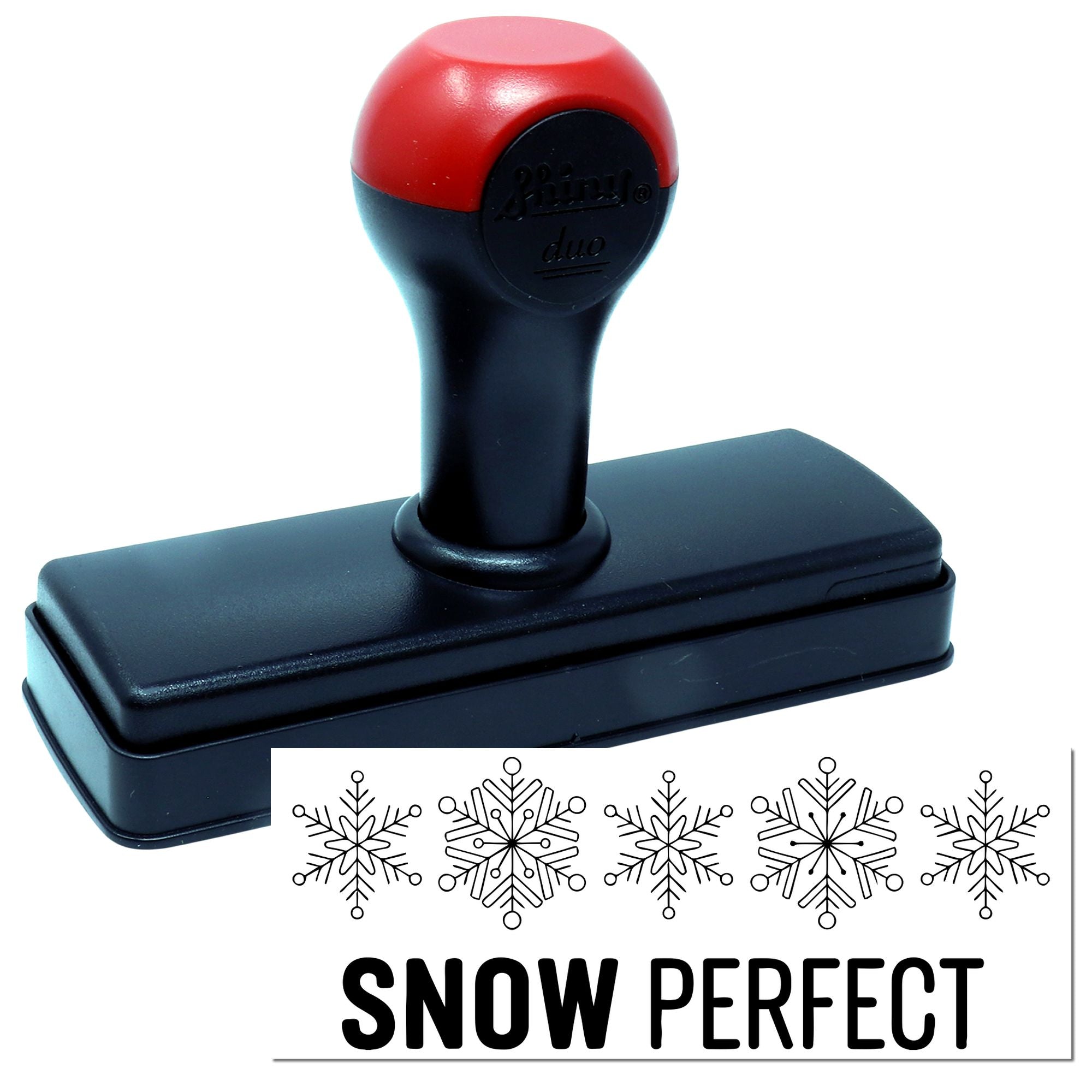 Red and black self-inking stamp with rectangular base and Snow Perfect snowflake seal design