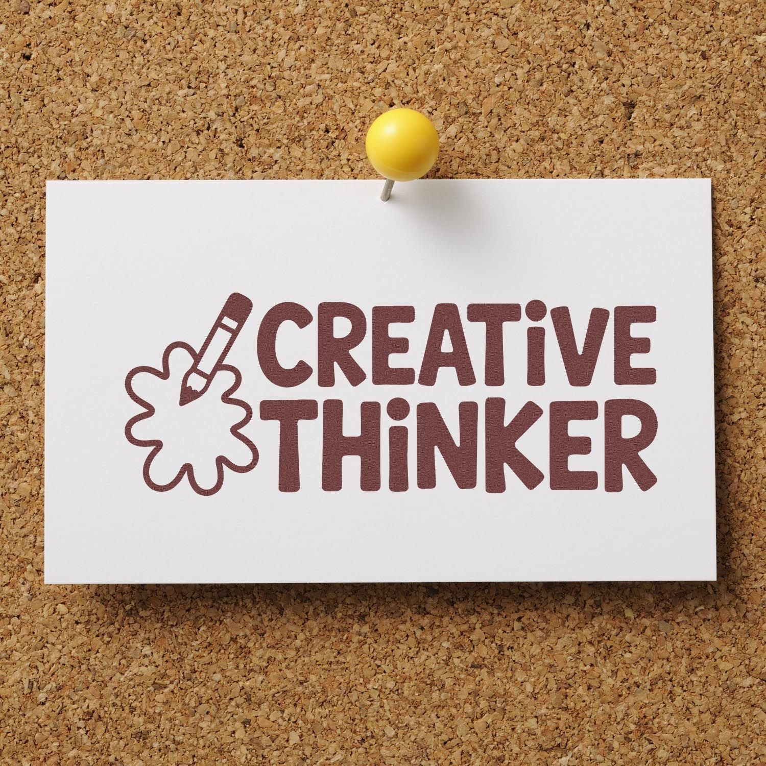 Brown Creative Thinker stamp seal on white card, pinned with a yellow pushpin against corkboard.