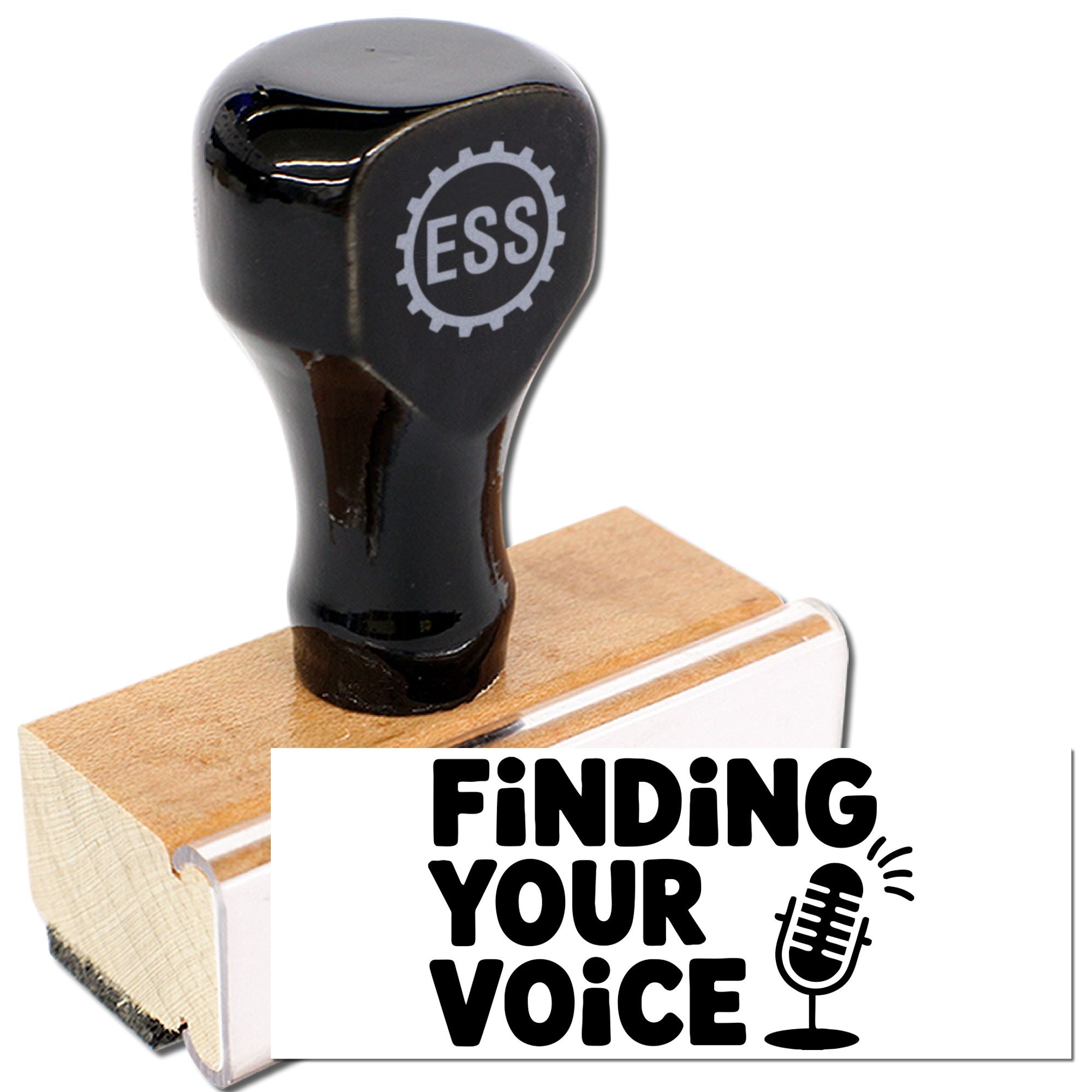 Black self-inking stamp with ESS logo on wooden base and white seal reading Finding Your Voice with microphone icon