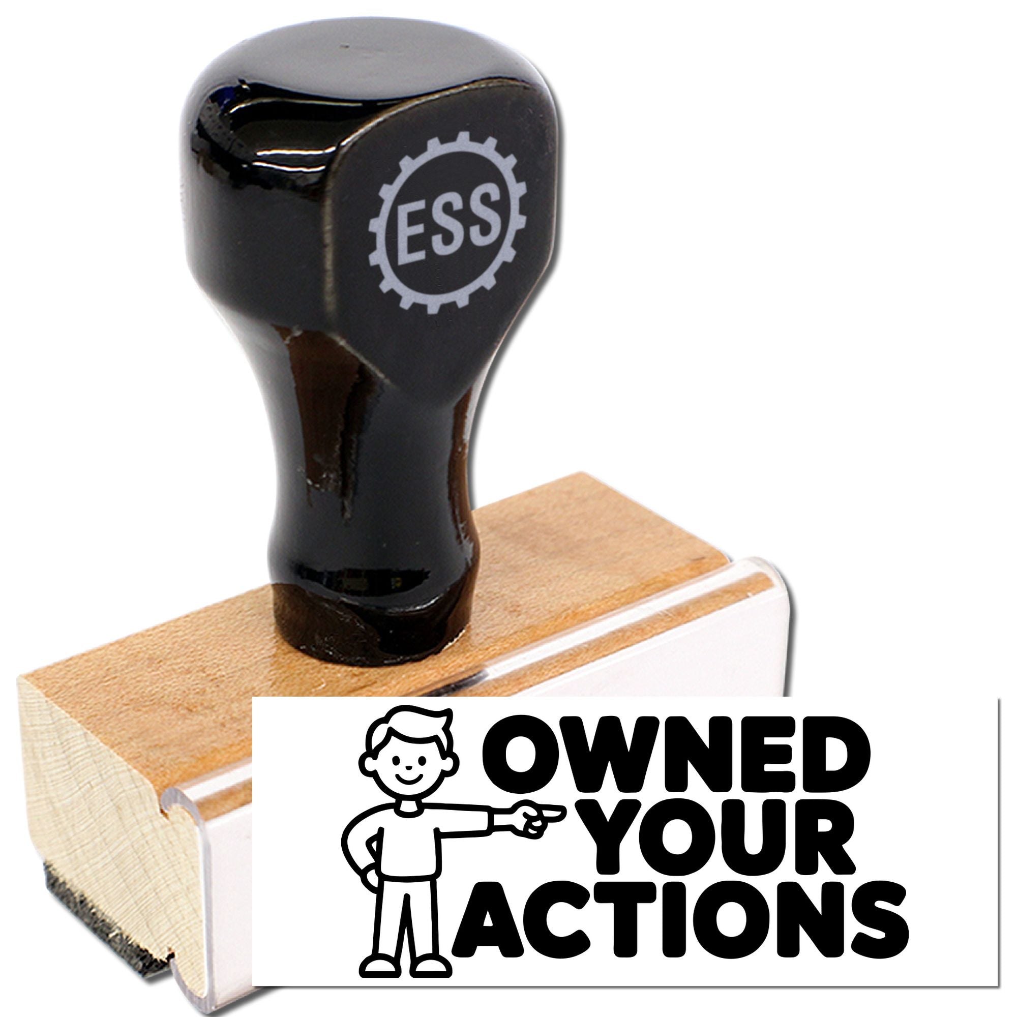 Black rubber stamp seal on wooden block with ESS logo and OWNED YOUR ACTIONS imprint