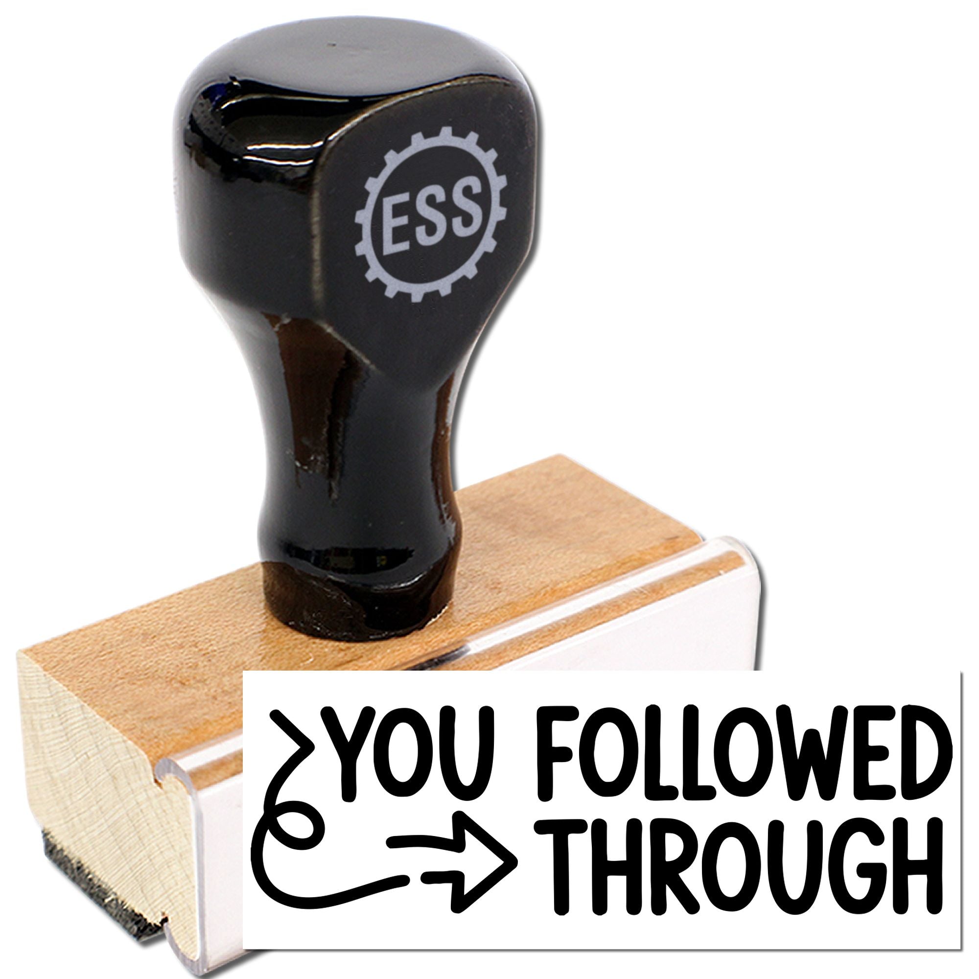 Black self-inking stamp with ESS logo on a wooden seal block, showing You Followed Through text.