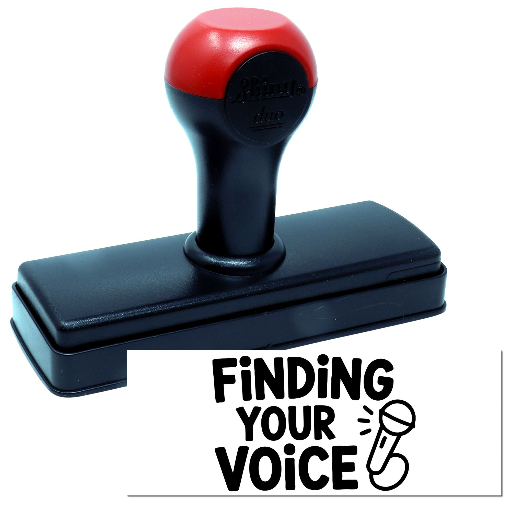 Red and black self-inking stamp with Finding Your Voice seal and microphone icon.