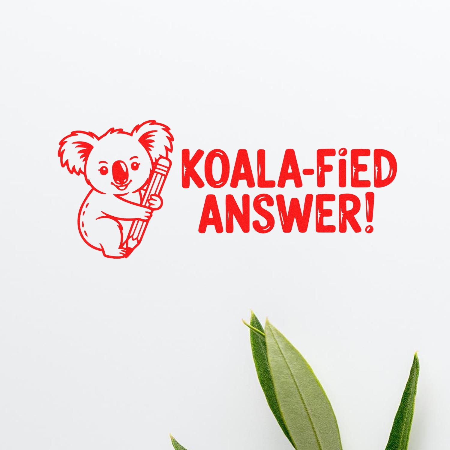 Red koala stamp seal with pencil and KOALA-FIED ANSWER! text on white, with green leaves.