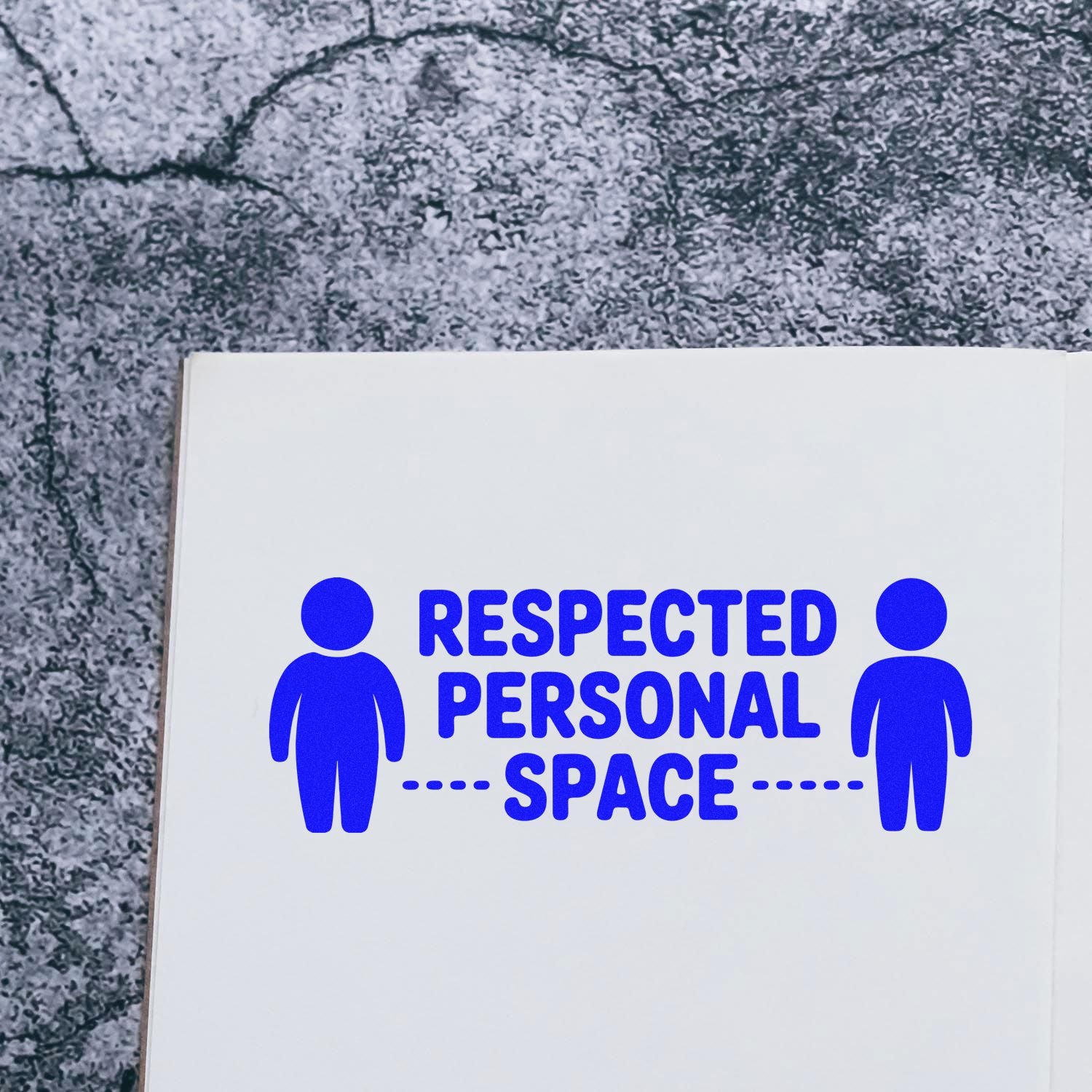 Blue respected personal space stamp with two person icons on a white seal card against a gray textured background.