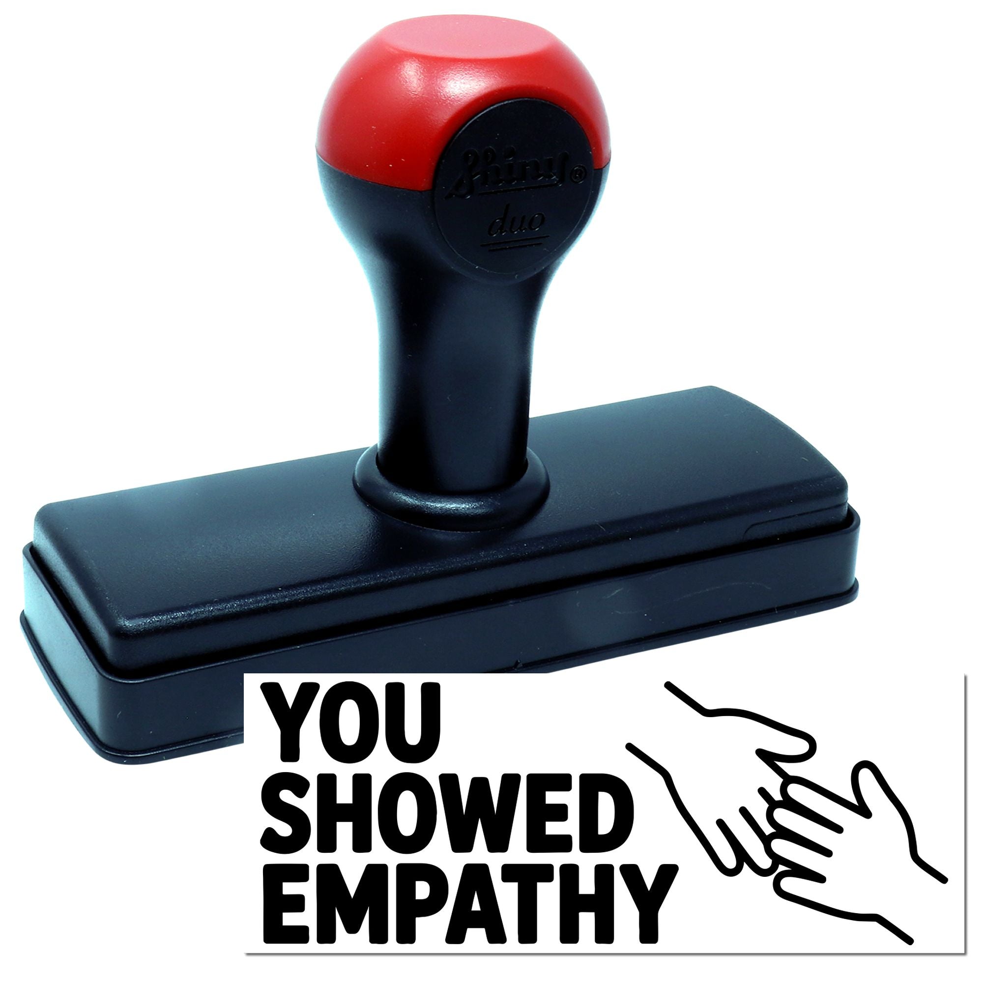 Red and black self-inking stamp and seal with You showed empathy text and handshake icon on a white background.