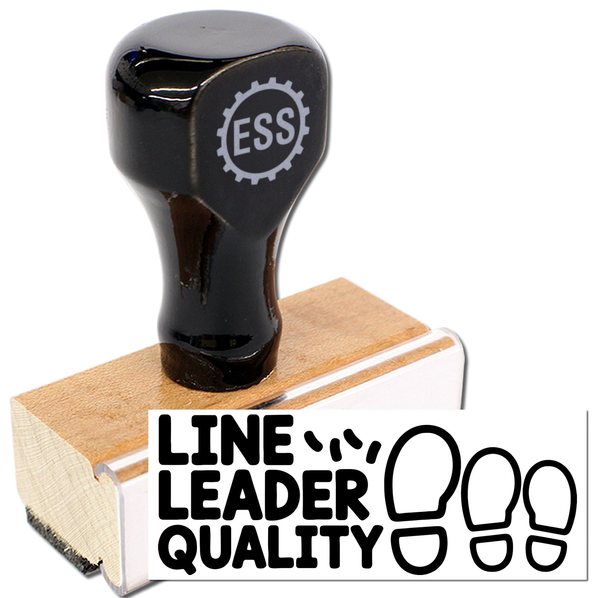 Black rubber stamp and seal on wooden block with ESS logo and Line Leader Quality text on white background.