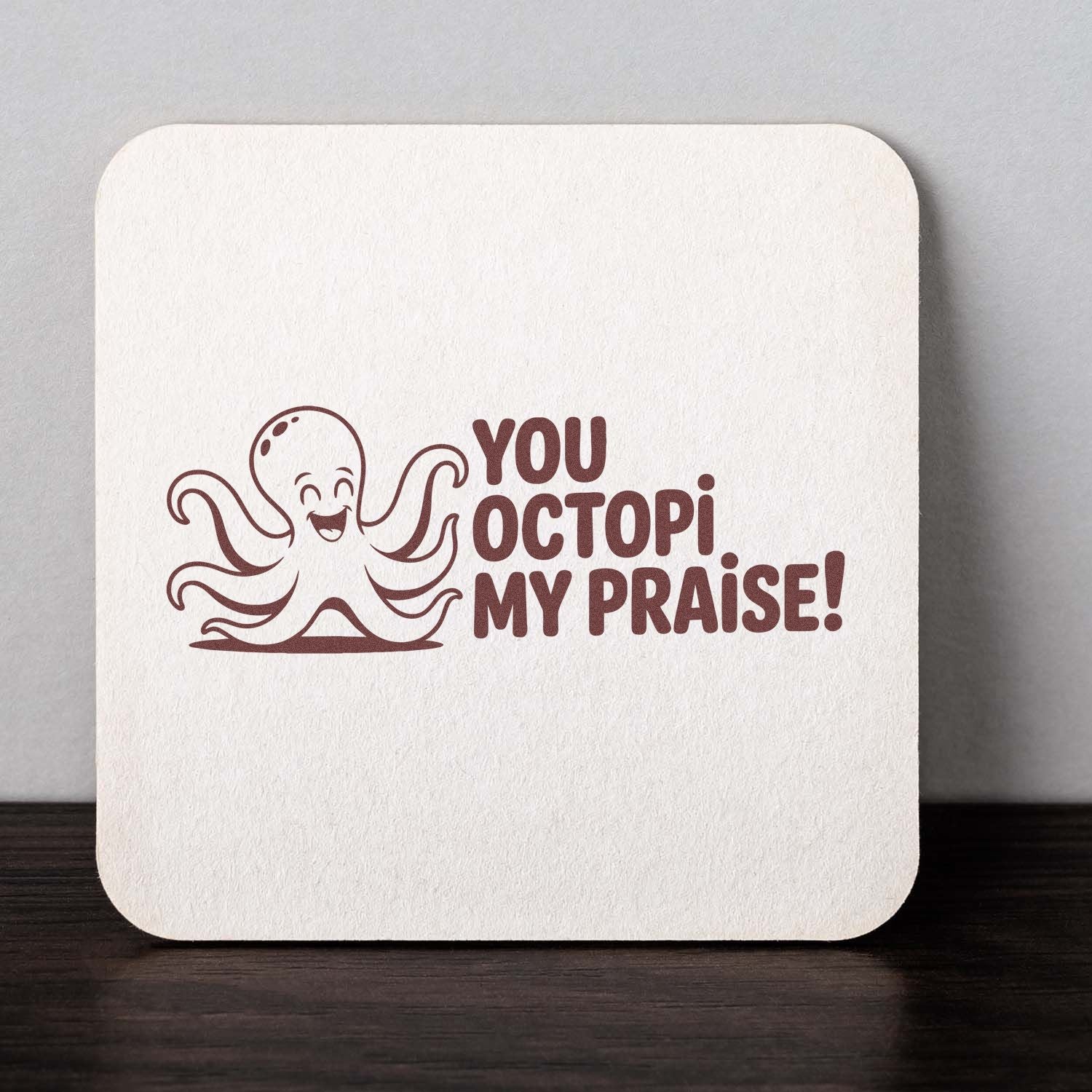 Maroon octopus stamp seal on white textured card with YOU OCTOPI MY PRAISE! text.