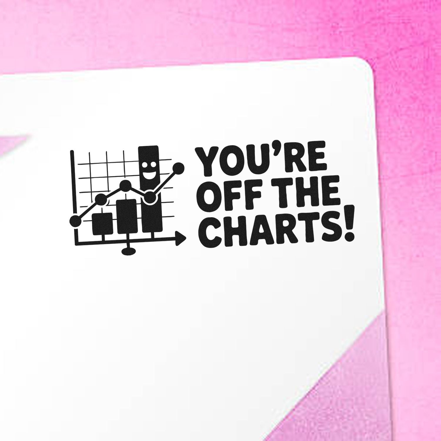 Black stamp seal reading YOURE OFF THE CHARTS! with chart icon on white paper, set against a pink background.