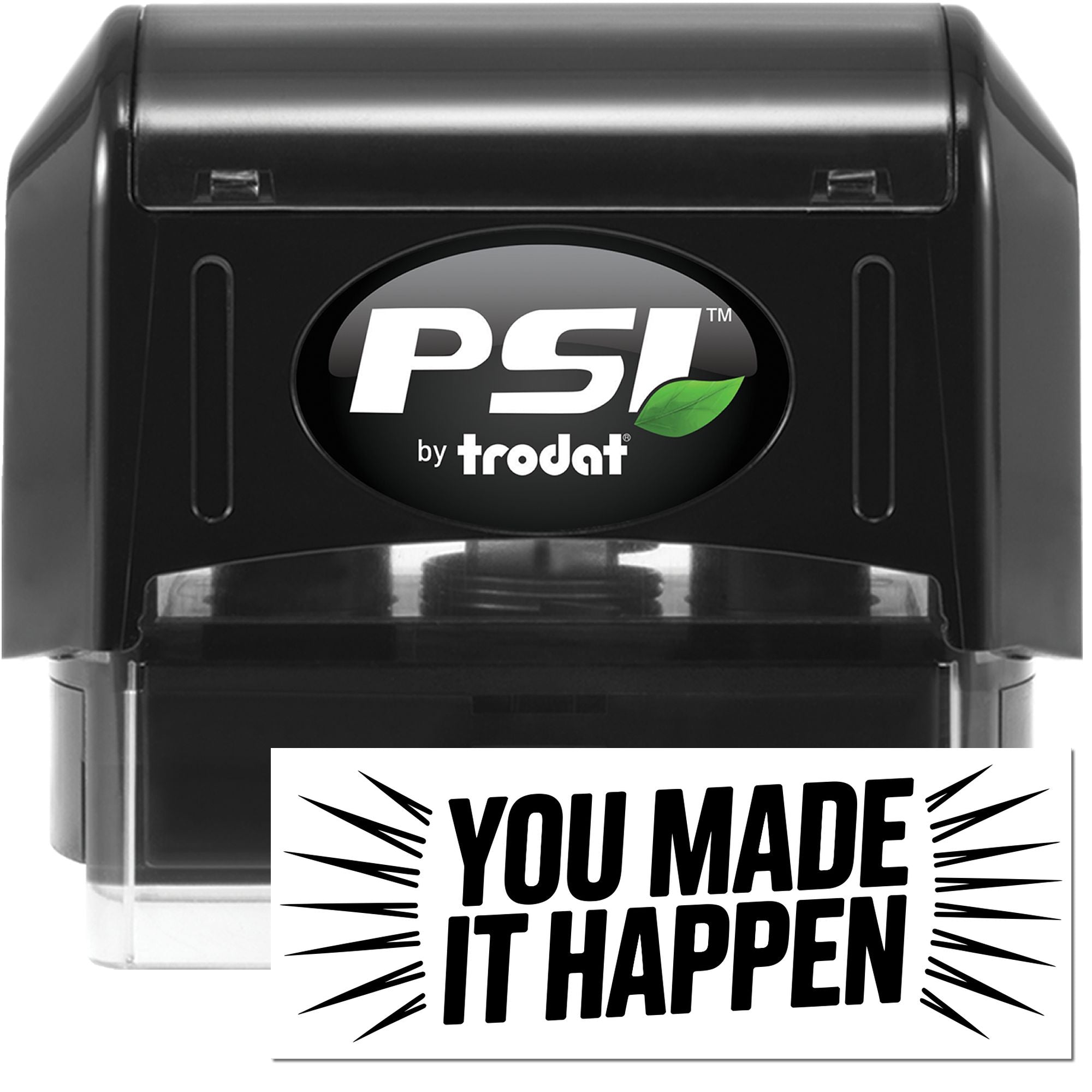 Black PSI by Trodat self-inking stamp and seal with white logo, green leaf accent, and YOU MADE IT HAPPEN imprint.