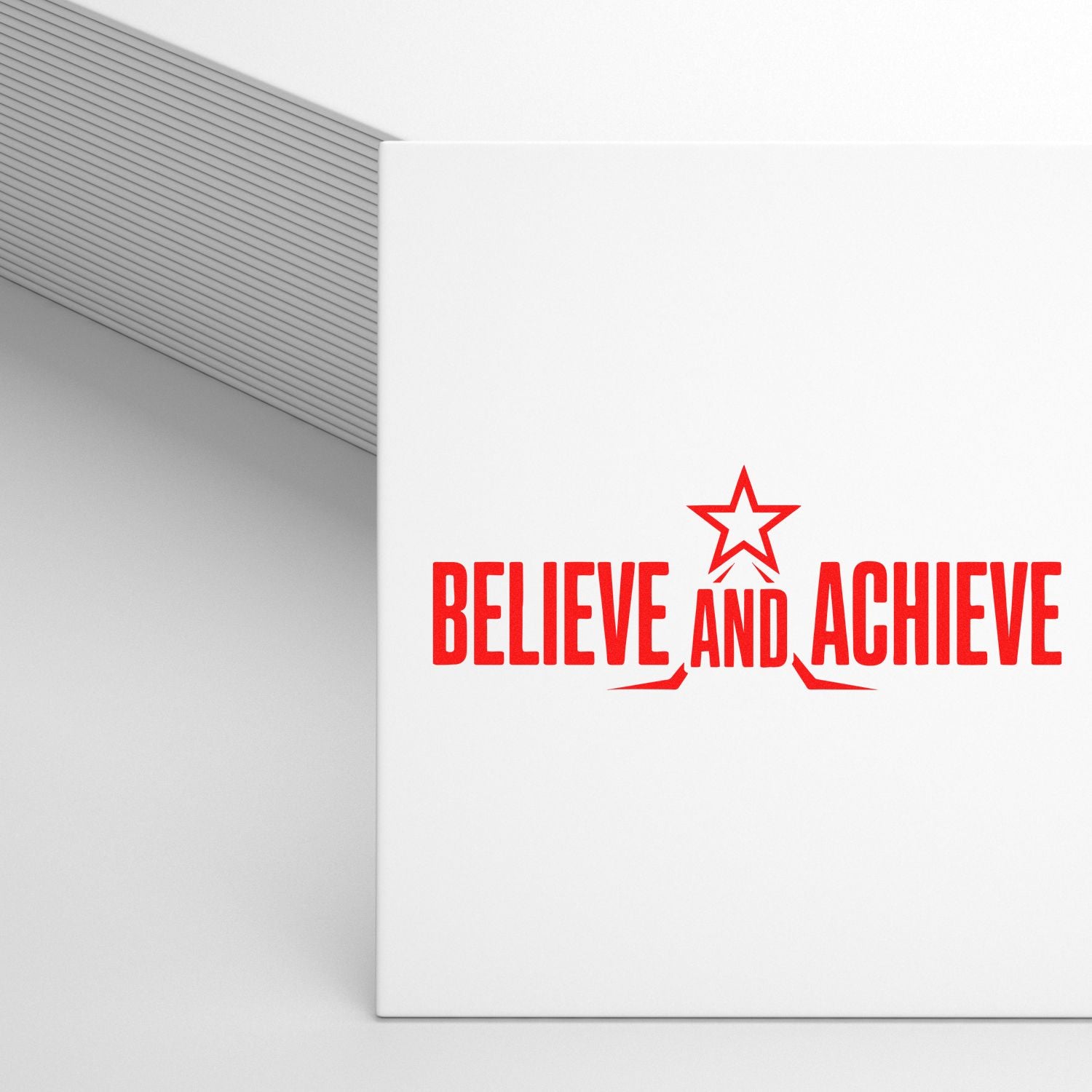 White custom stamp and seal sample with red BELIEVE AND ACHIEVE text and star logo on a light gray background.