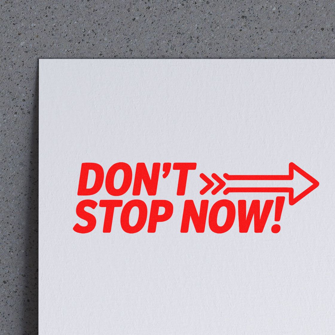 Red DONT STOP NOW! stamp and seal with arrow on white paper.