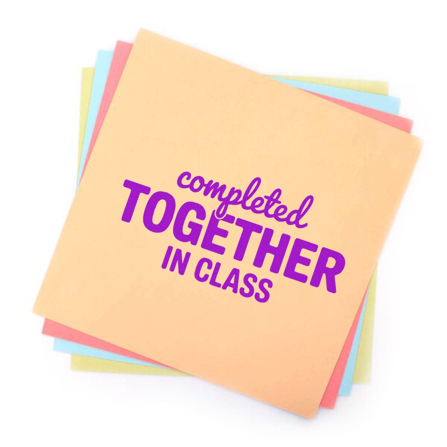 Pastel classroom rubber stamp with purple Completed Together in Class text on stacked colored paper sheets.